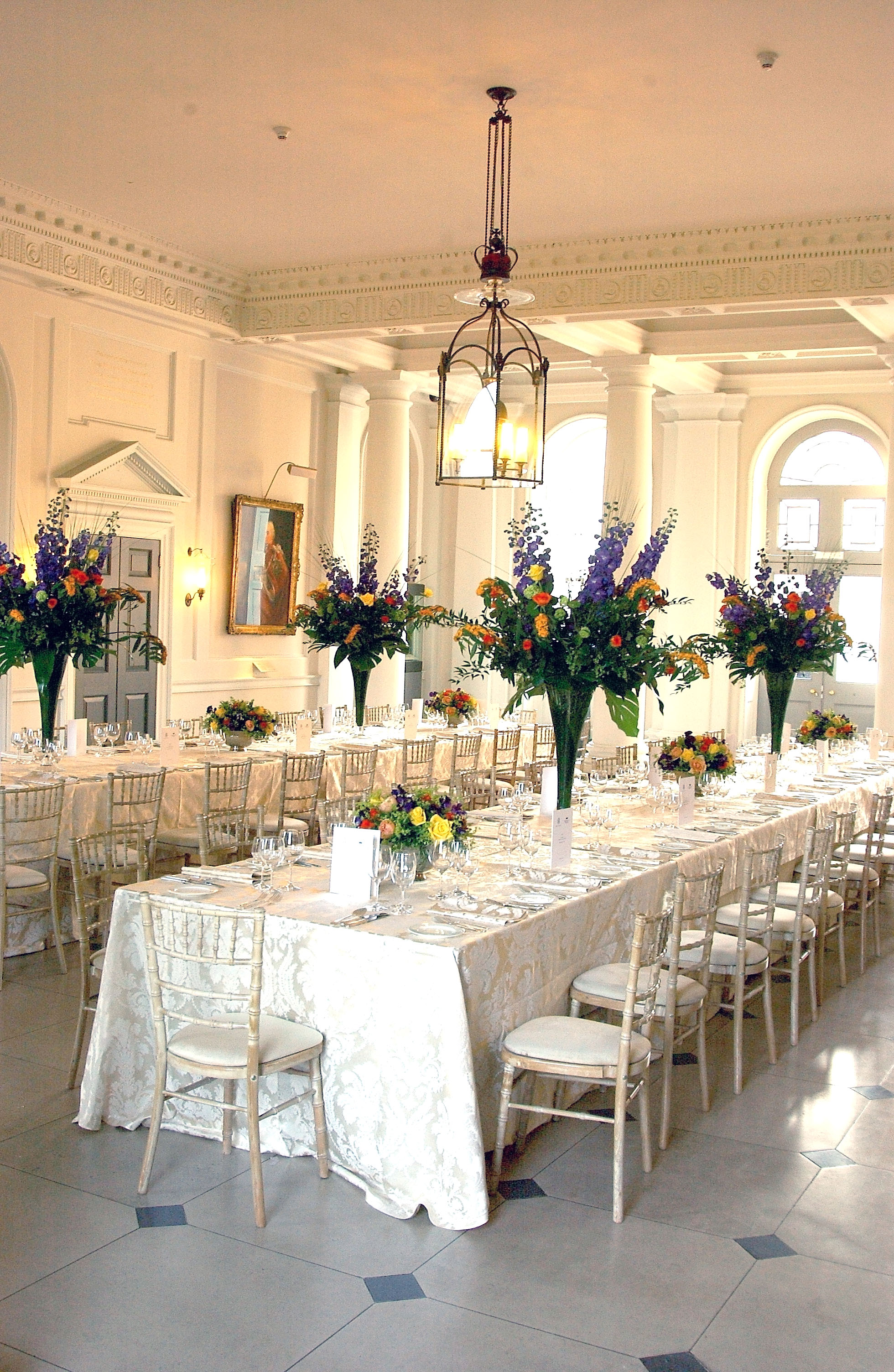 Elegant Seamen's Hall banquet setup with floral arrangements for weddings and corporate events.