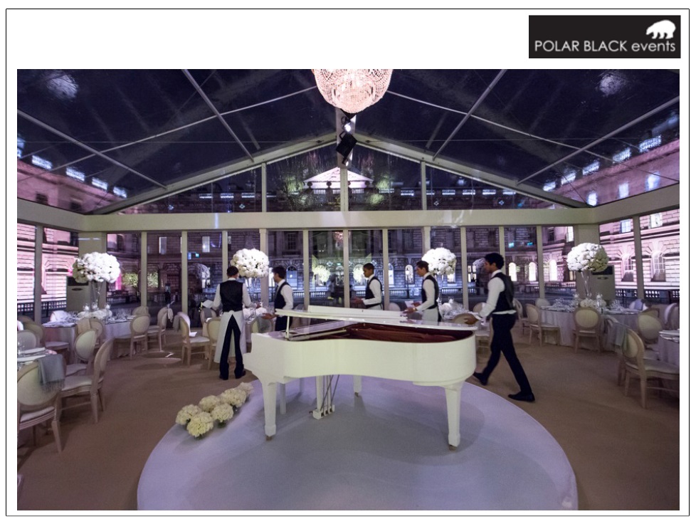 Edmond J. Safra Fountain Court with grand piano, ideal for upscale weddings and events.
