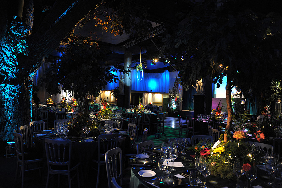 Elegant Underglobe event space with lush greenery for corporate events and gala dinners.