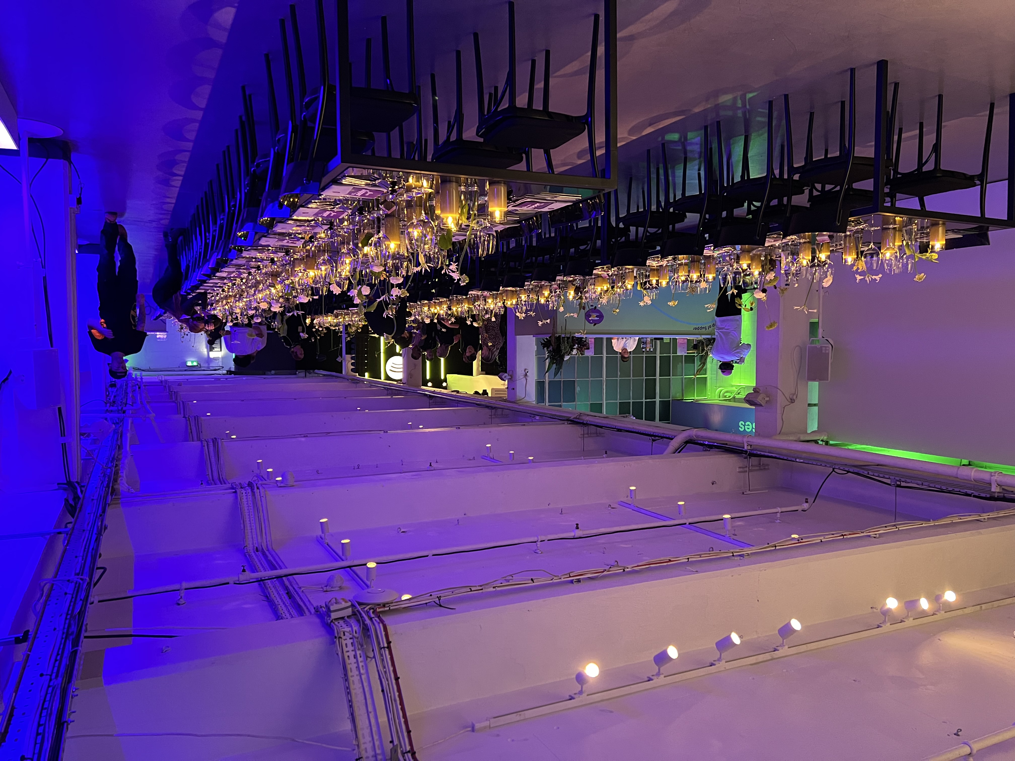 Stylish dinner setup in Main Gallery, The Vinyl Factory Soho with floral centerpieces.