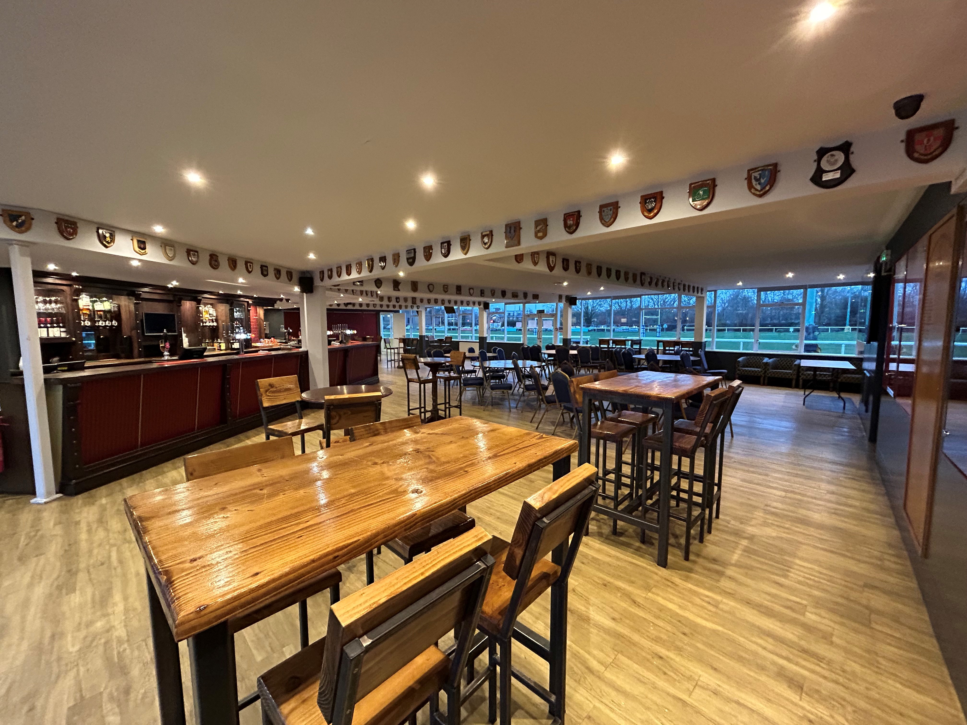 Murray Judd Room at Richmond Athletic Ground, modern bar, ideal for events and meetings.