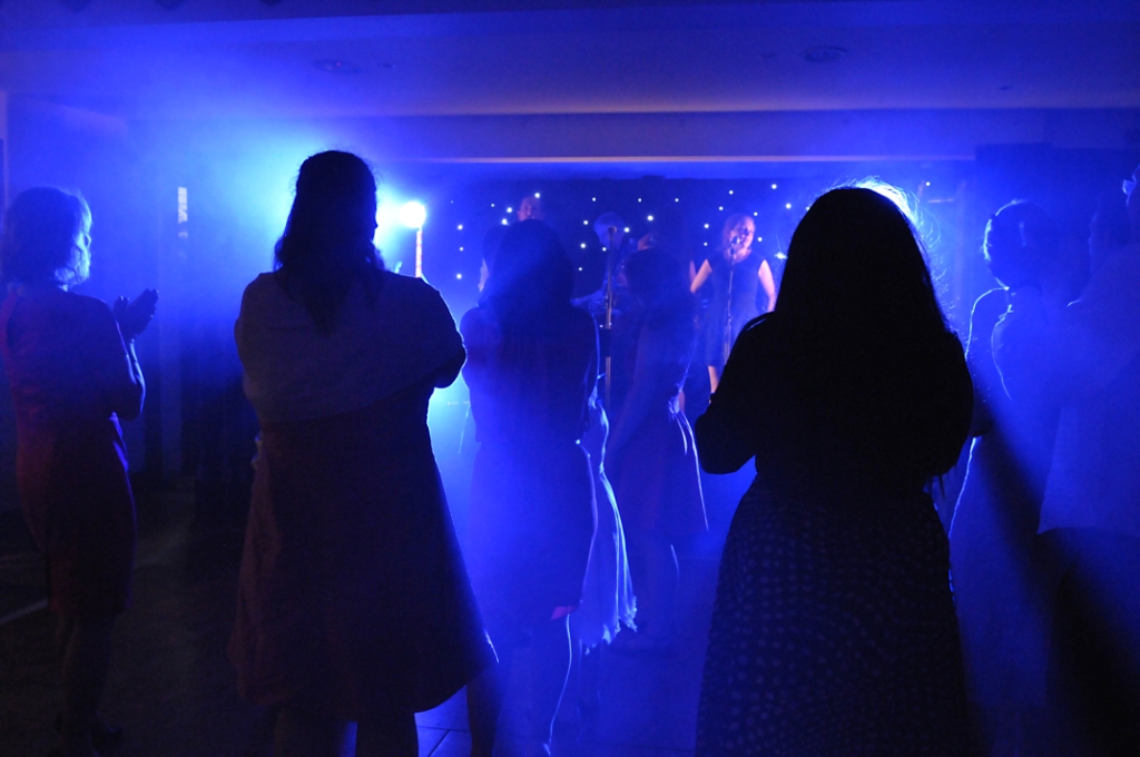 Murray Judd Room event with blue lighting, ideal for networking and celebrations.