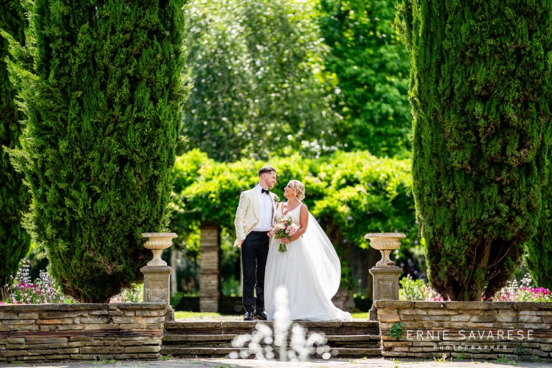 Tudor Gallery outdoor venue with lush greenery, perfect for weddings and romantic events.