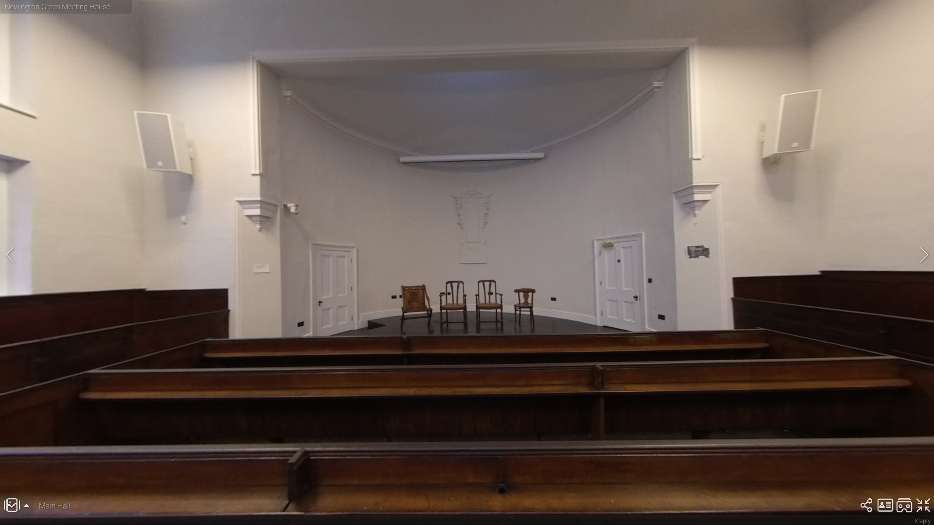 Main Hall in Newington Green Meeting House, minimalist event space for workshops and discussions.