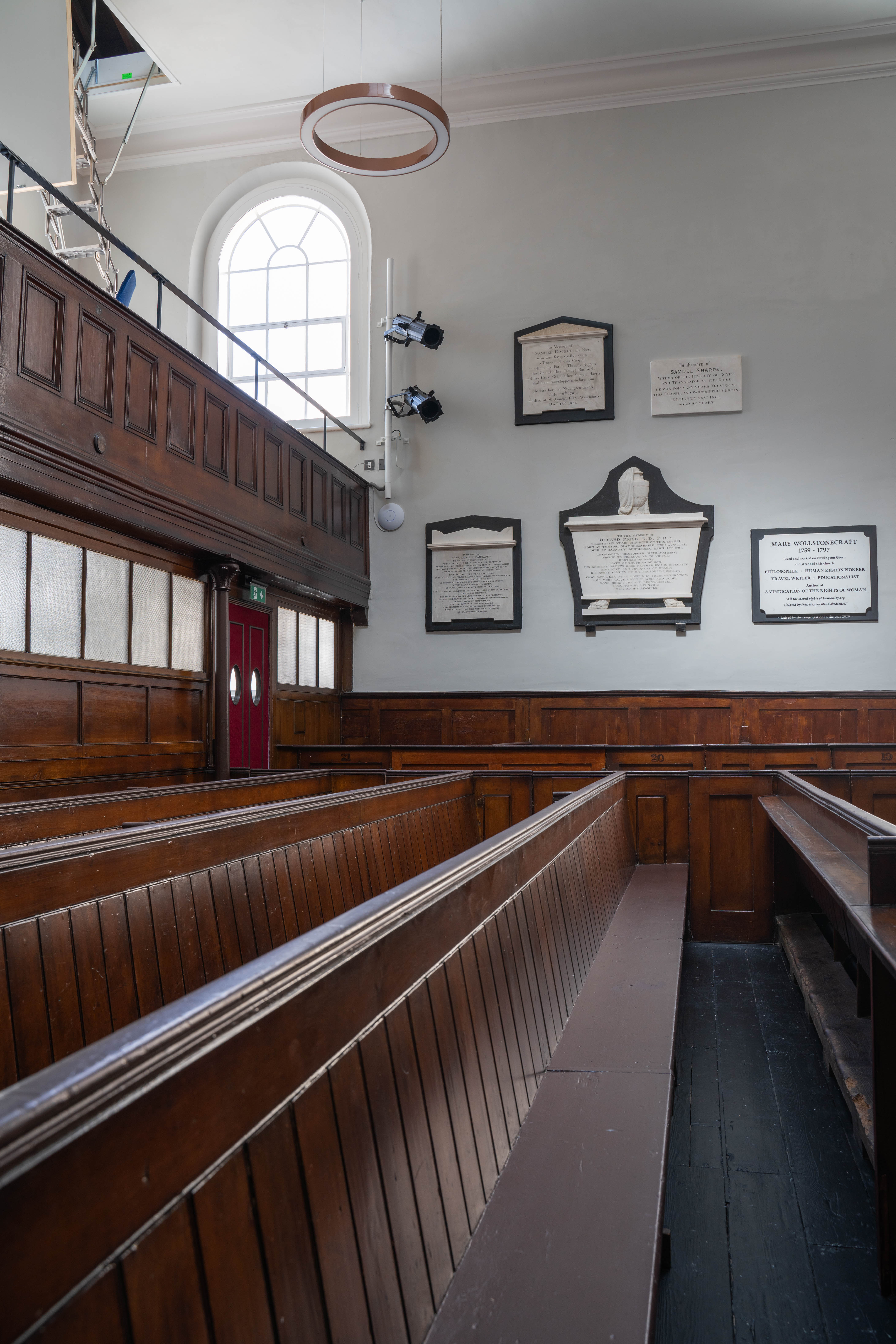 Historic Newington Green Meeting House Main Hall with wooden benches for community events.