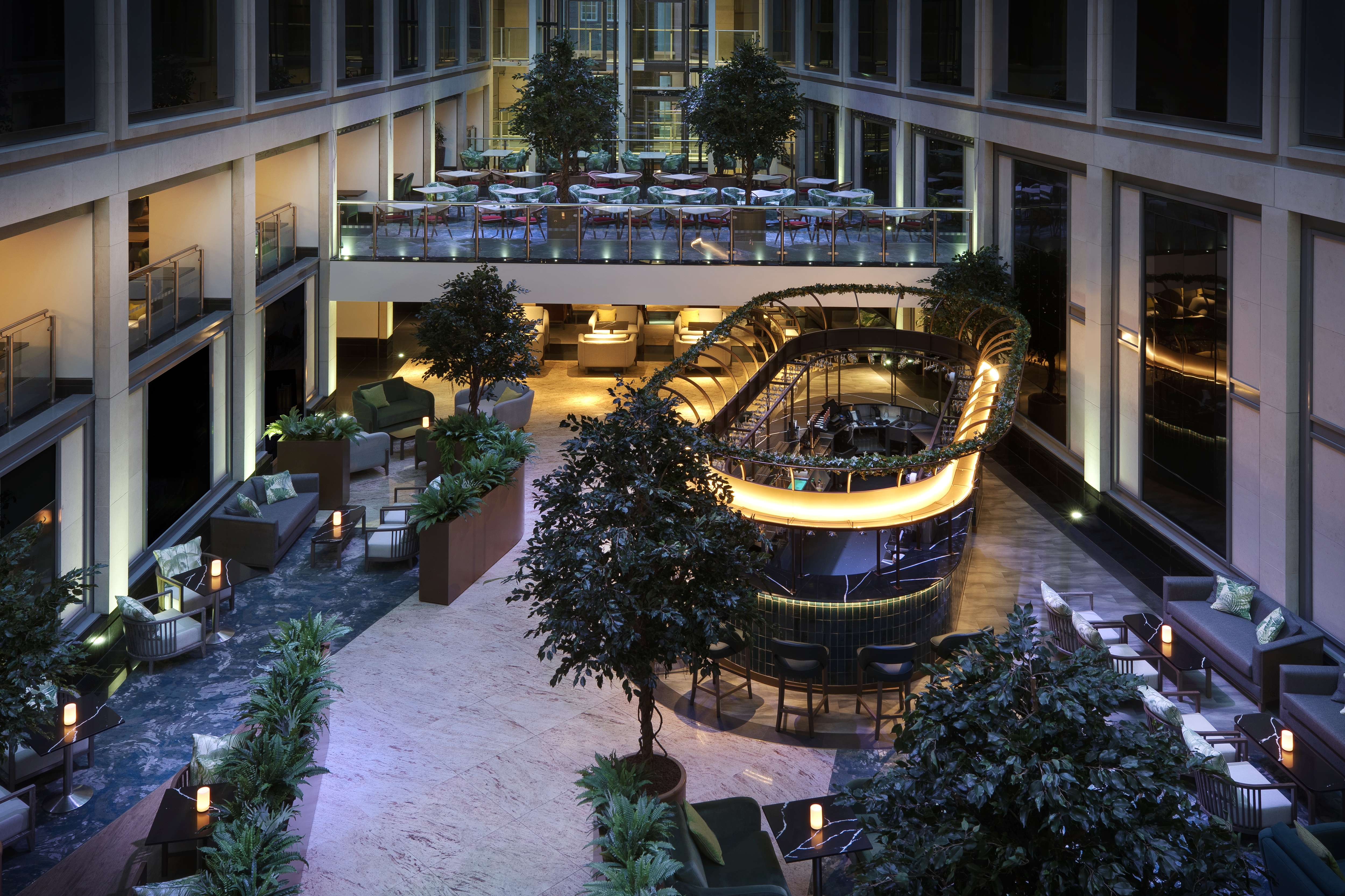 Milton Suite at Leonardo Royal Hotel: modern atrium with bar, ideal for events and meetings.