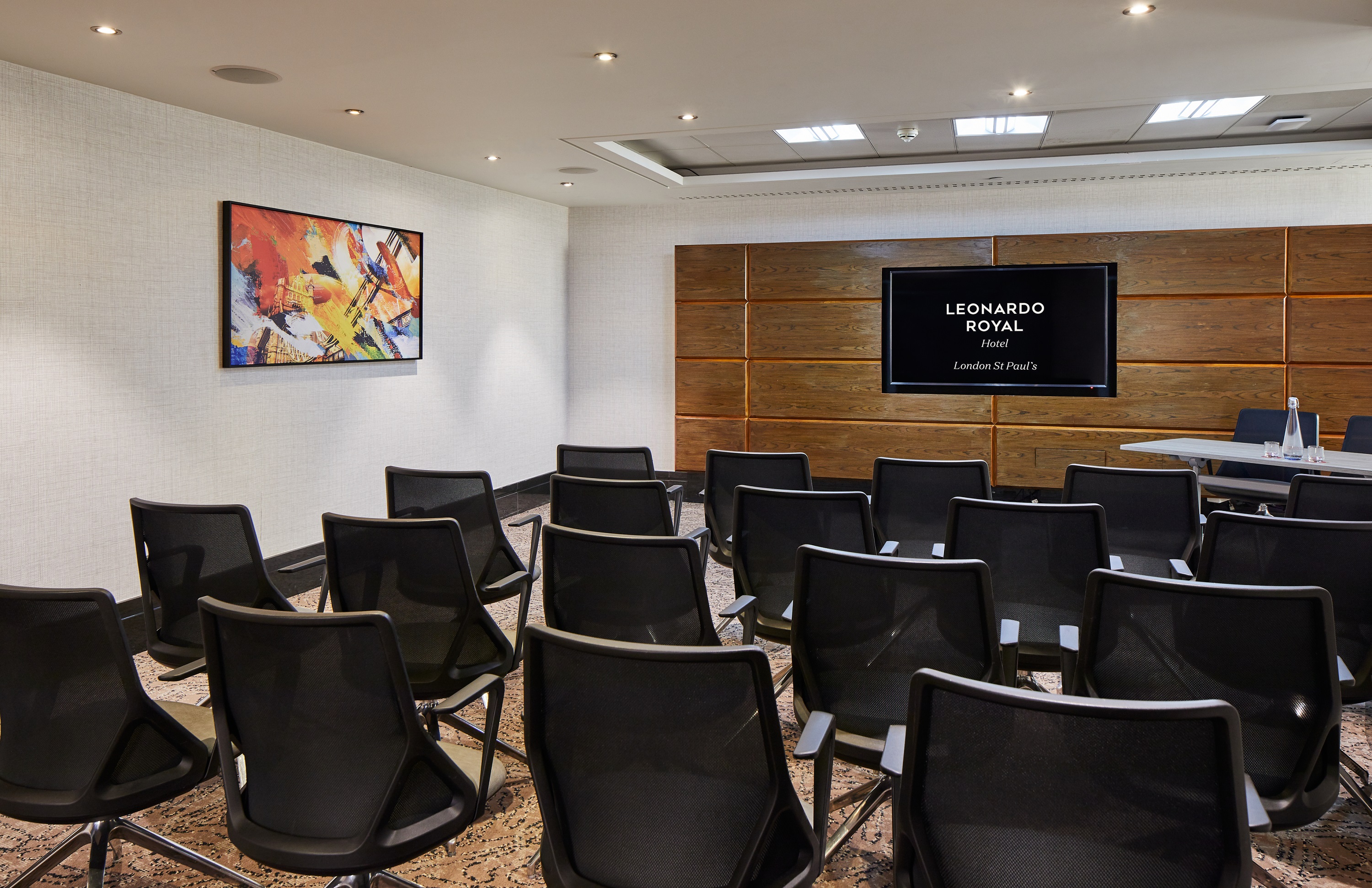 Churchill Suite meeting room at Leonardo Royal Hotel London, modern decor for corporate events.