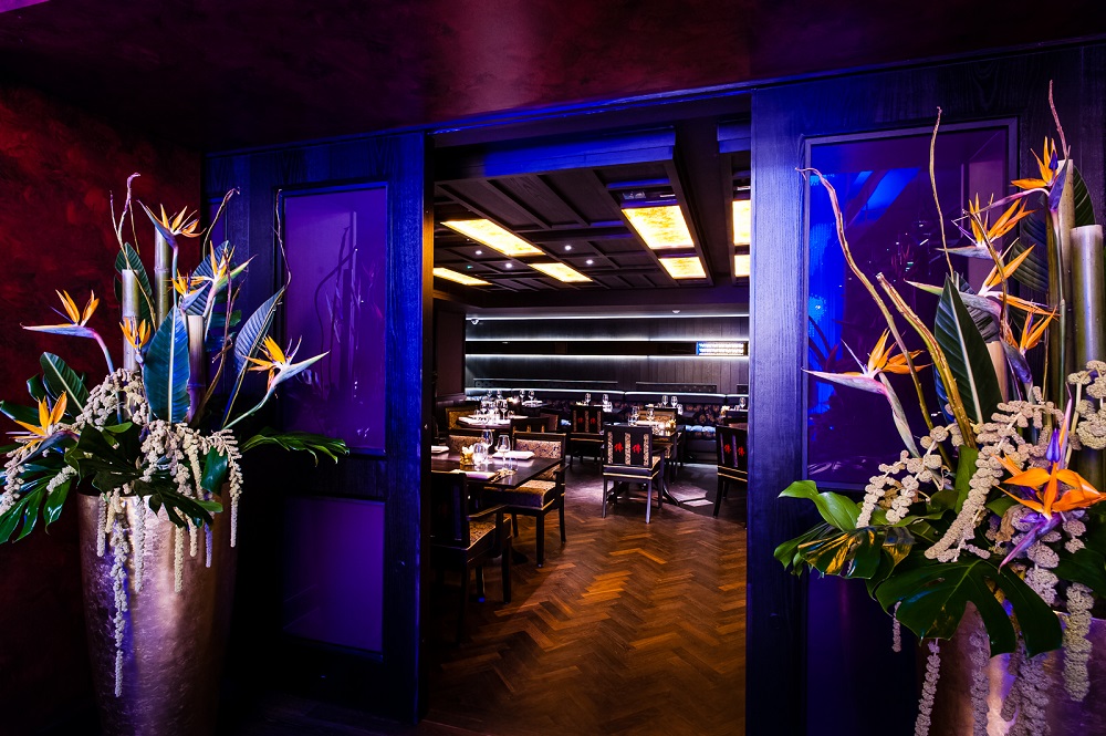 Private Dining Room at Buddha Bar London with vibrant floral decor for upscale events.