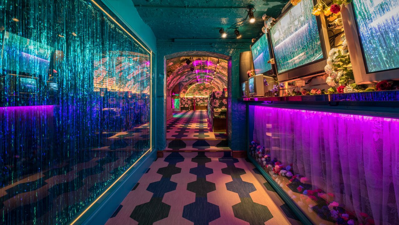 Vibrant Back Bar at Blame Gloria, ideal for networking events and celebrations.