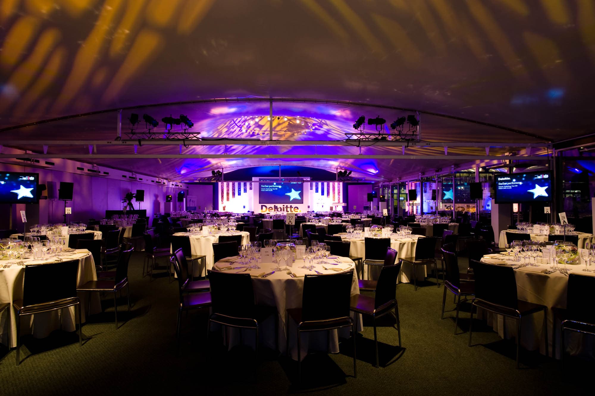 Nursery Pavilion at Lord's Cricket Ground set for a gala dinner with elegant tables.