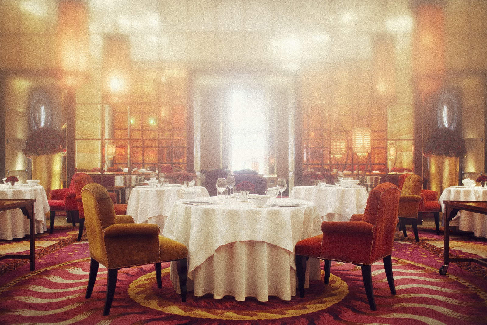 Elegant dining space with plush seating, perfect for upscale events and gatherings.