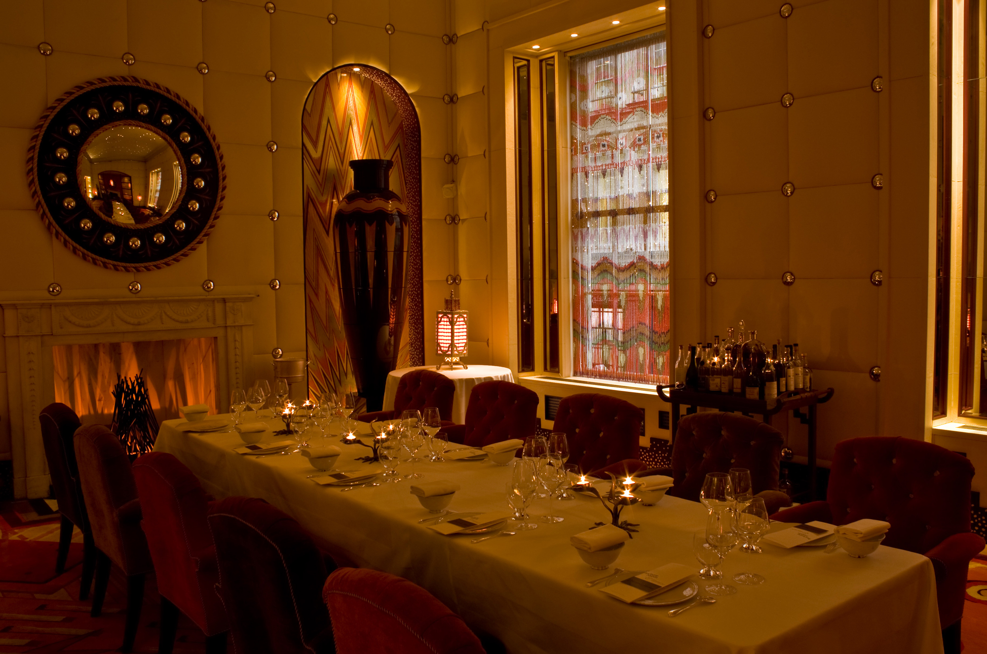 Elegant dining room sketch for upscale events, featuring fine tableware and warm lighting.