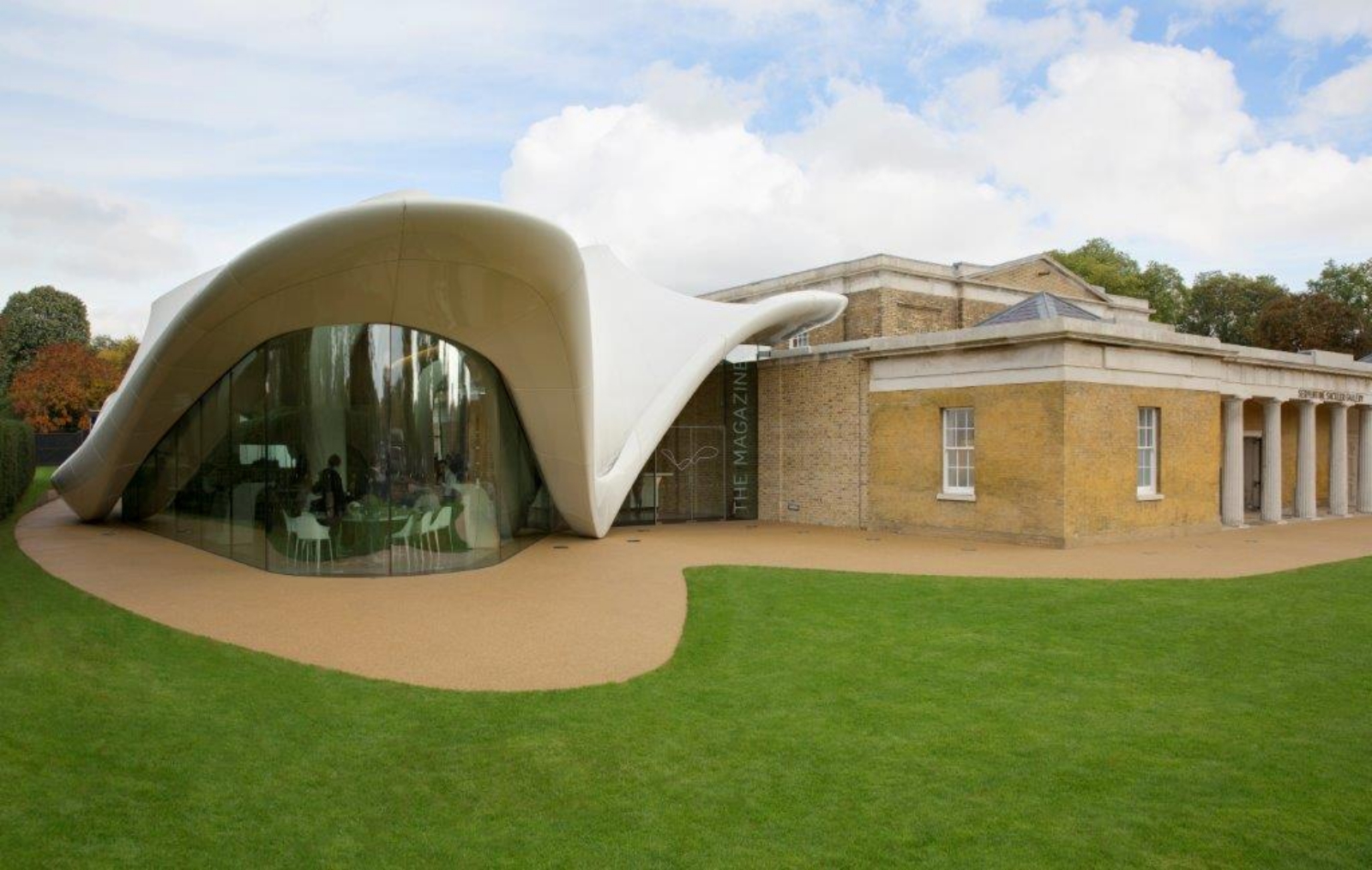 Modern Magazine Restaurant with expansive glass design, perfect for innovative events.