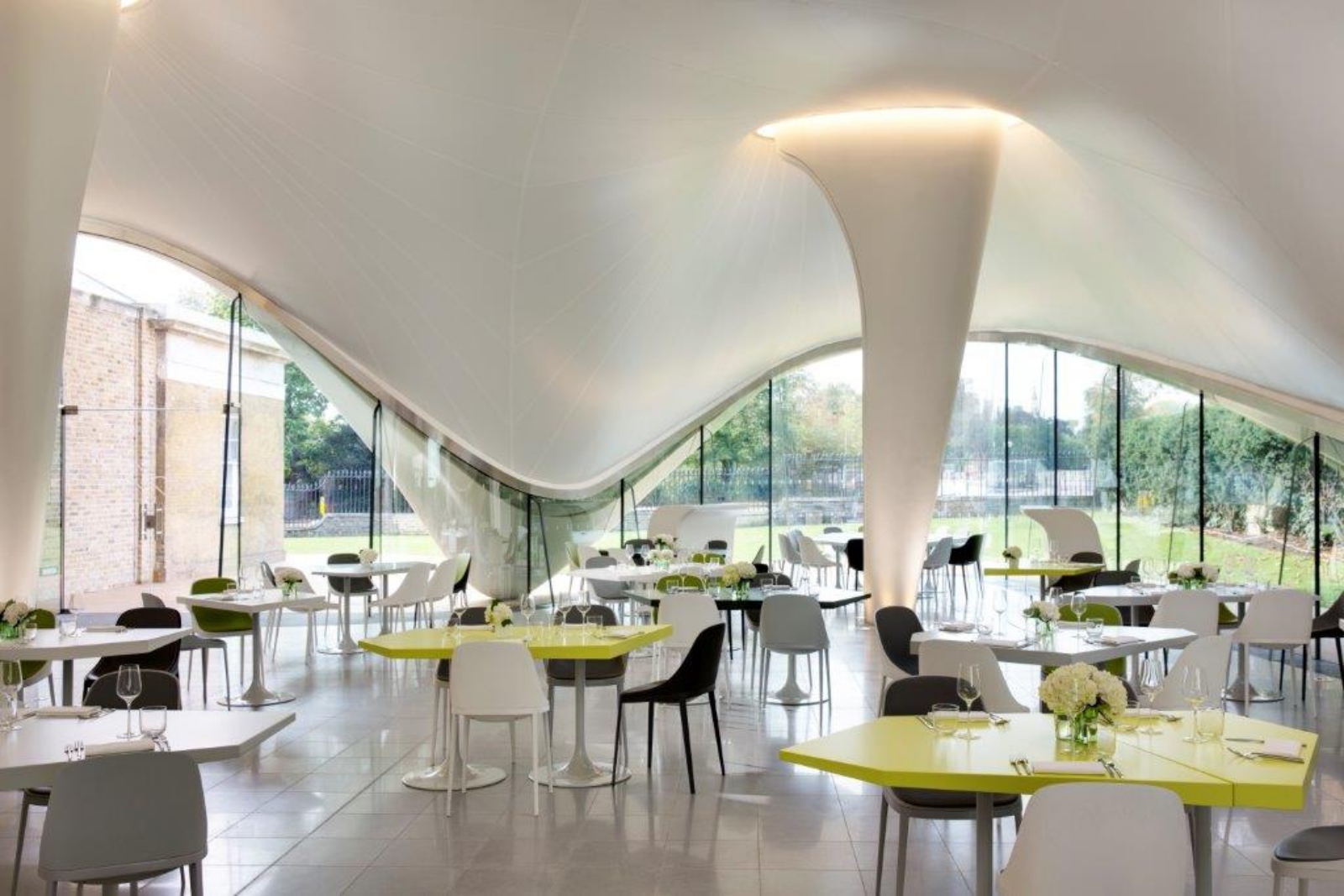 Modern event space with large windows, ideal for corporate meetings or intimate receptions.