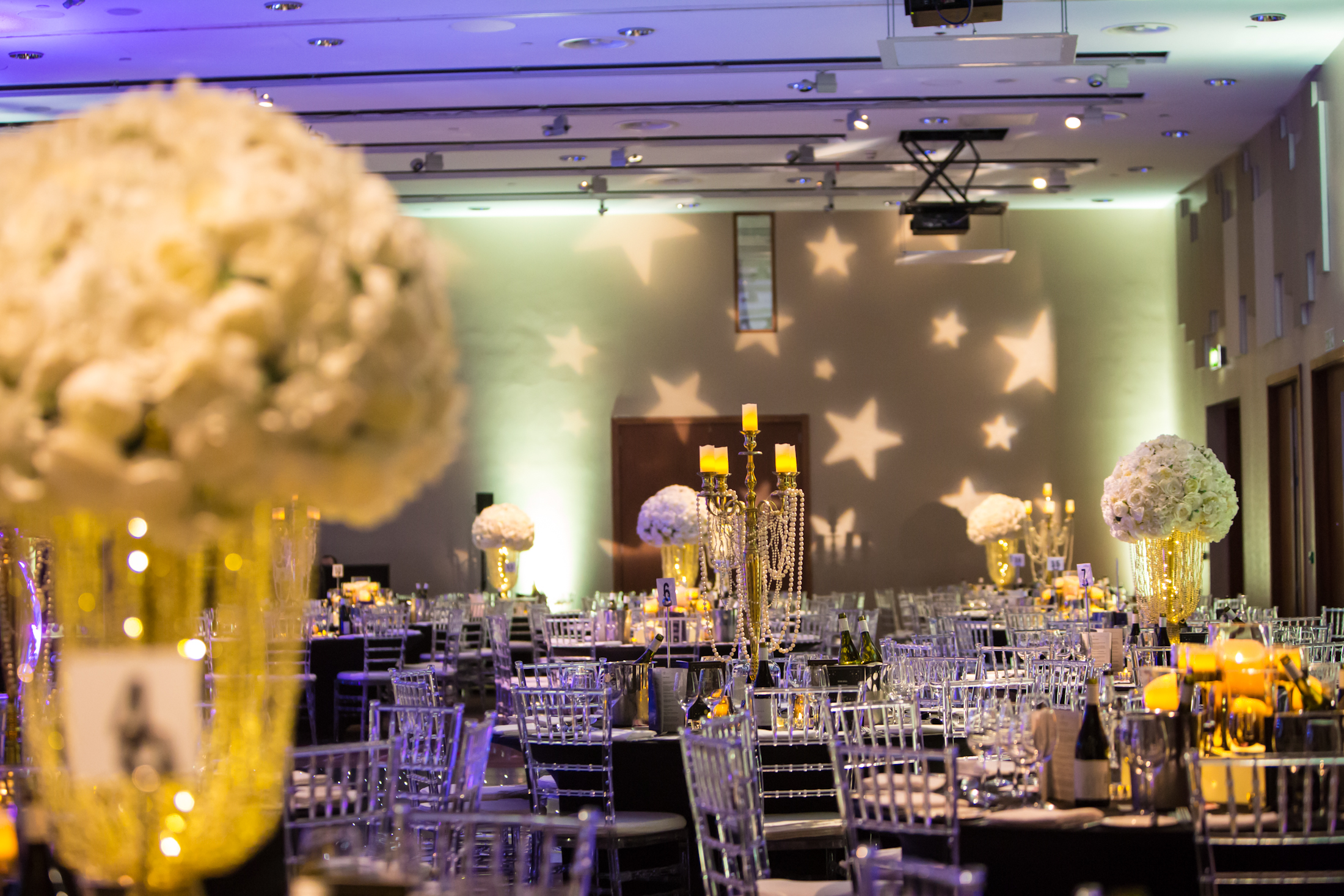 Grace Suite at Hilton Liverpool: elegant event space with floral centerpieces for upscale galas.