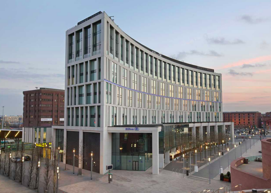 Modern meeting room with glass facade at Hilton Liverpool for corporate events.