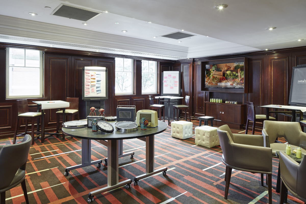 Boardroom at Leeds Marriott Hotel with modern furnishings for meetings and events.