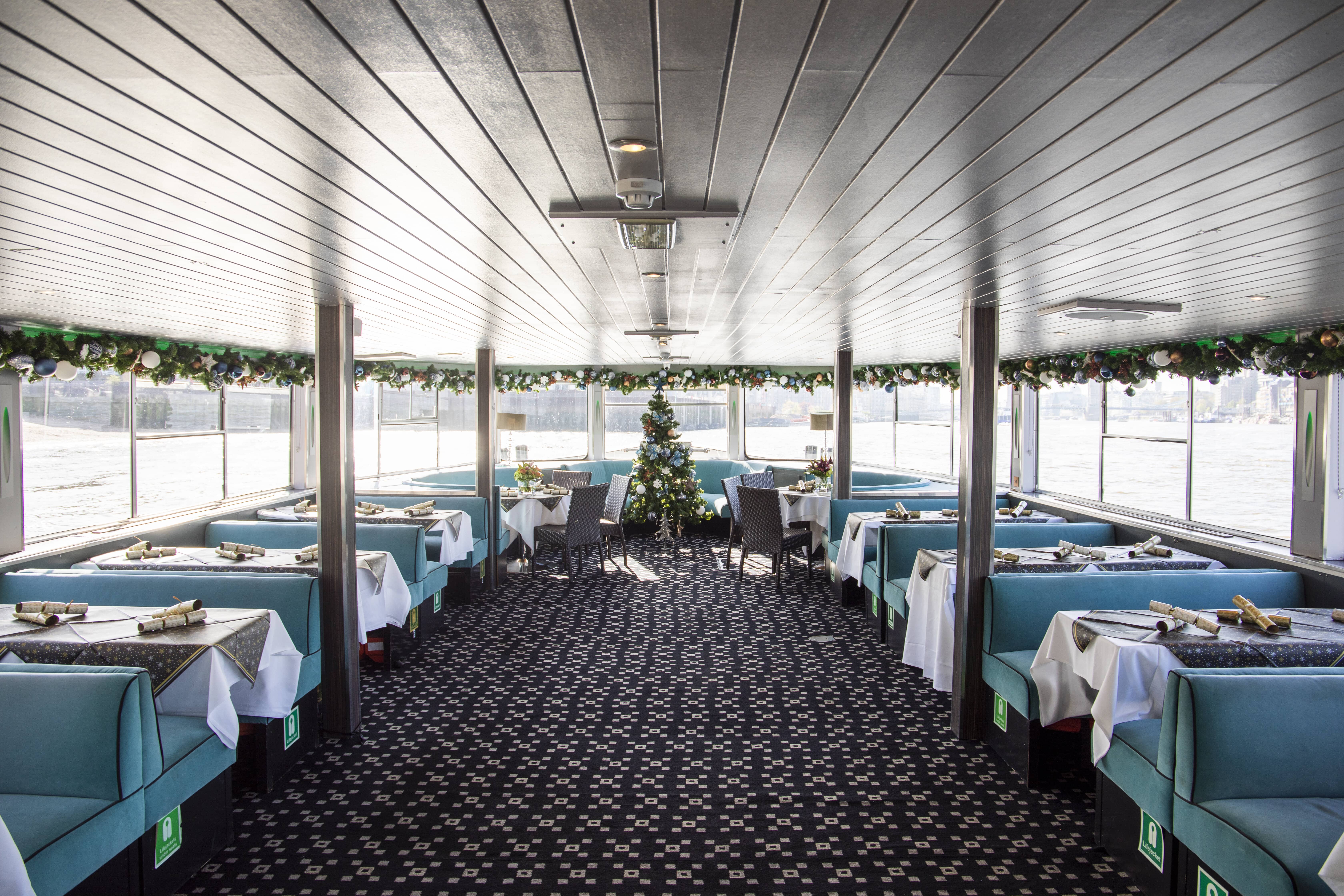 Elegant boat event space with festive decor for intimate gatherings and celebrations.