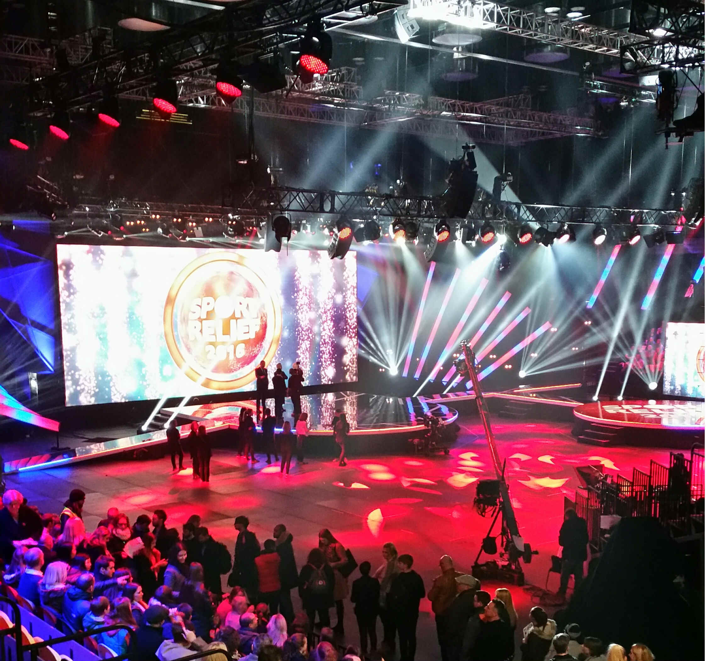 Main Arena at Copper Box: modern stage, vibrant lighting for events and presentations.