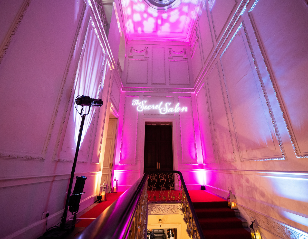Elegant entrance with pink lighting for exclusive Christmas parties at Kent House.