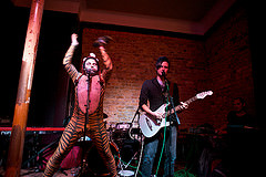 Lively musician performance at The Boat House, Four Thieves - unique event entertainment.