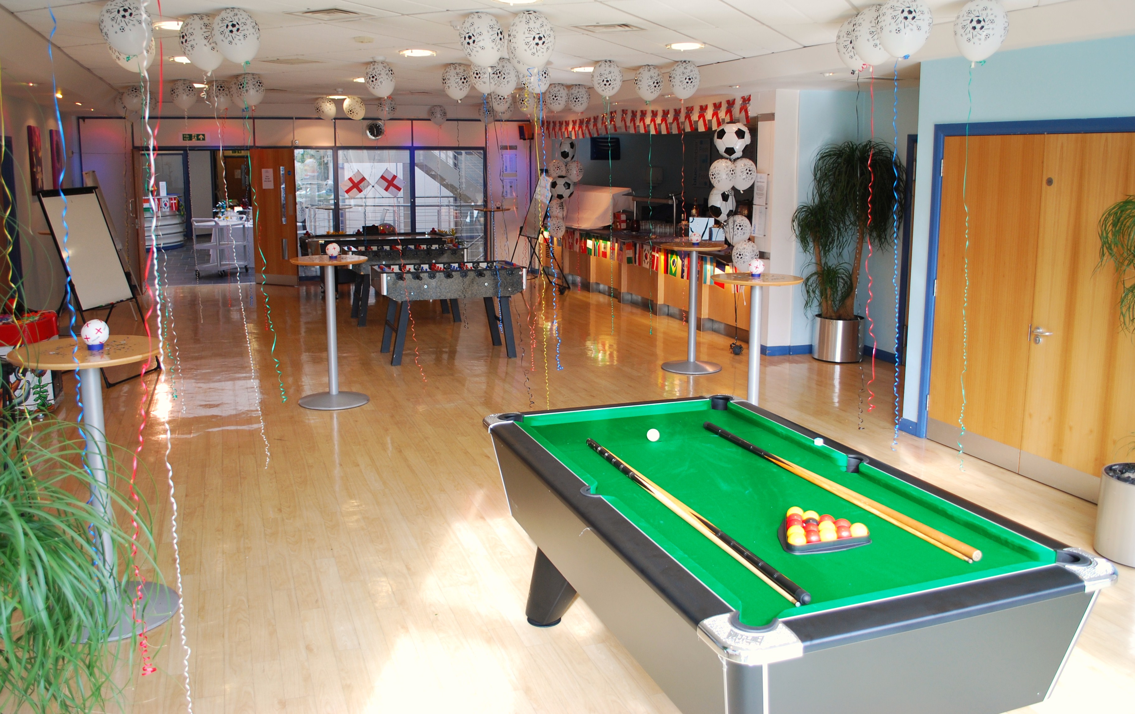 Blue Cafe Bar at The Ark: versatile event space with pool table for gatherings and meetings.