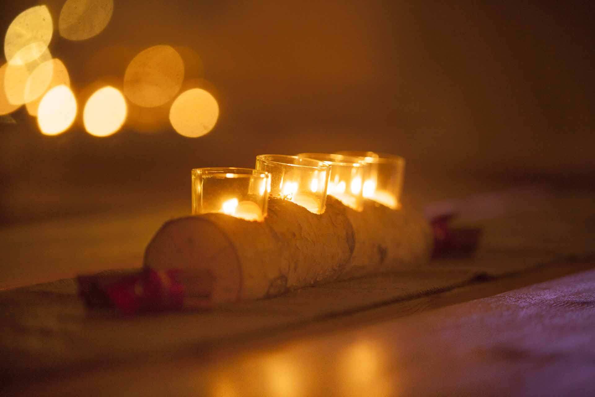 Forest Tepee centerpiece with glowing candles, perfect for weddings and intimate events.