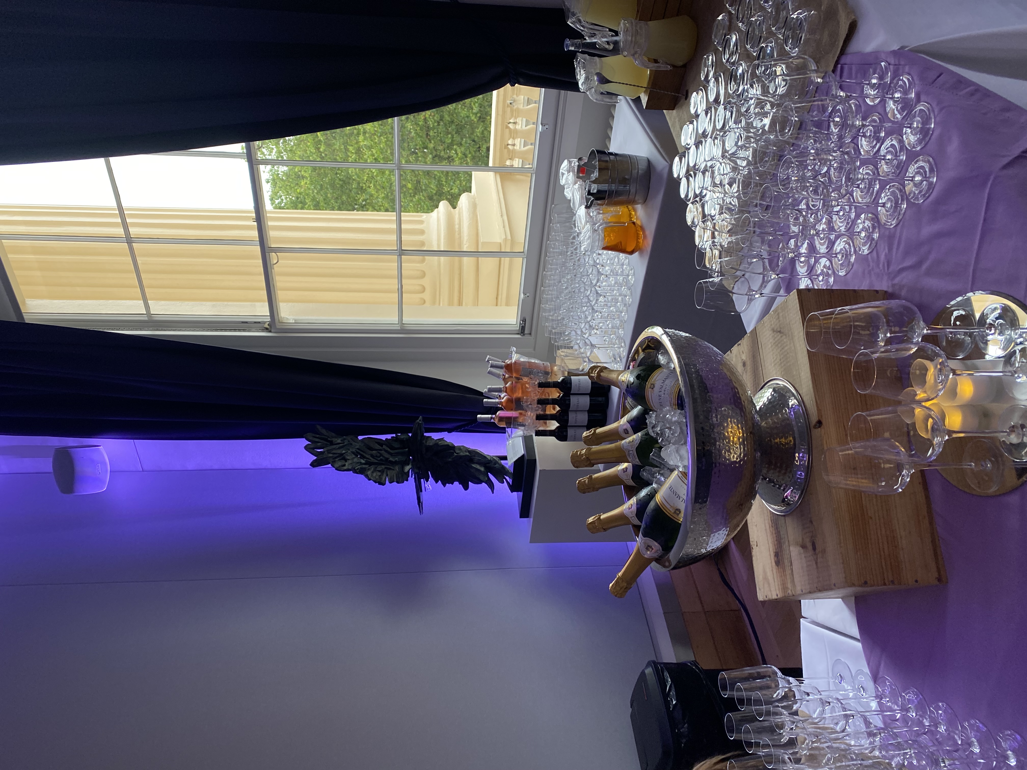 Elegant beverage station with champagne, wines, and cocktails for upscale events.