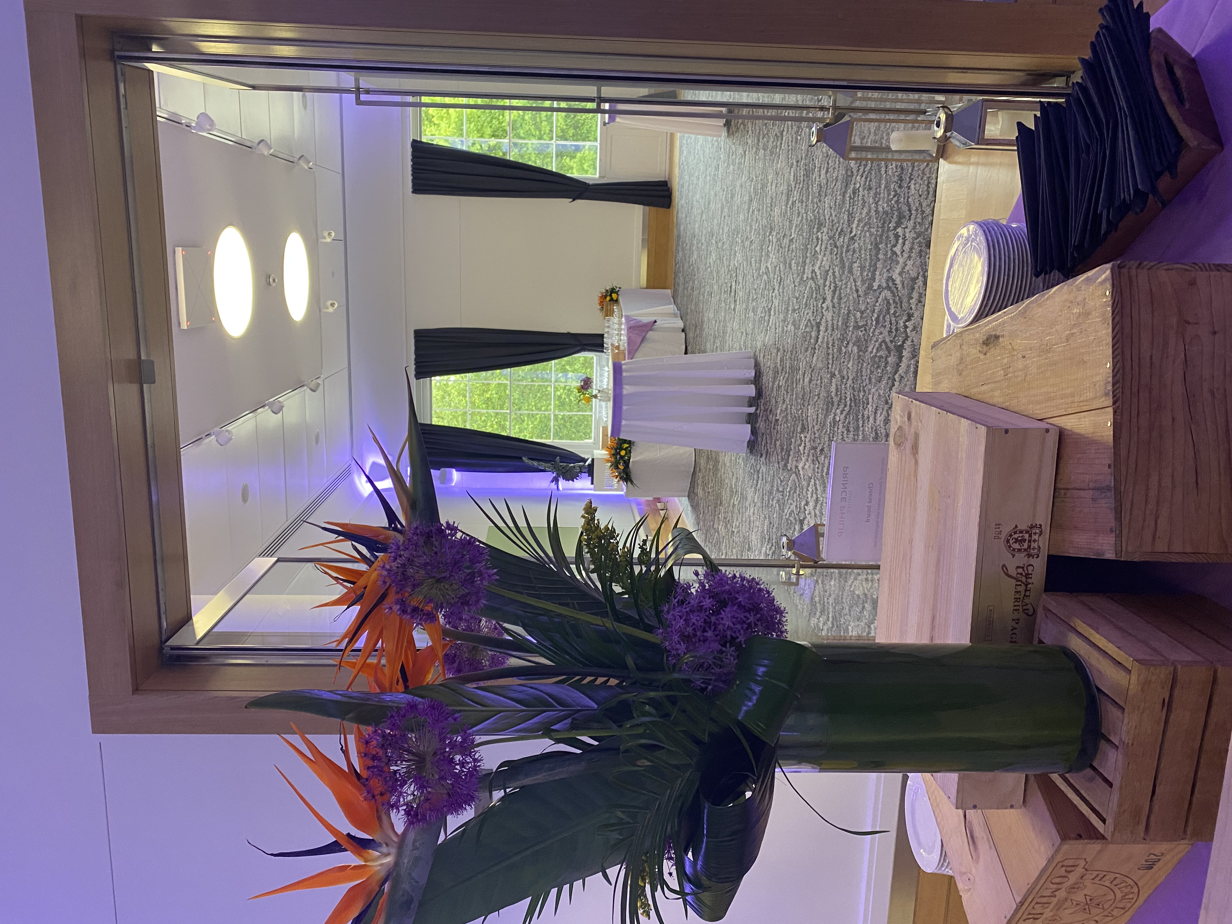 Elegant event space at National Grid with floral decor, perfect for networking receptions.