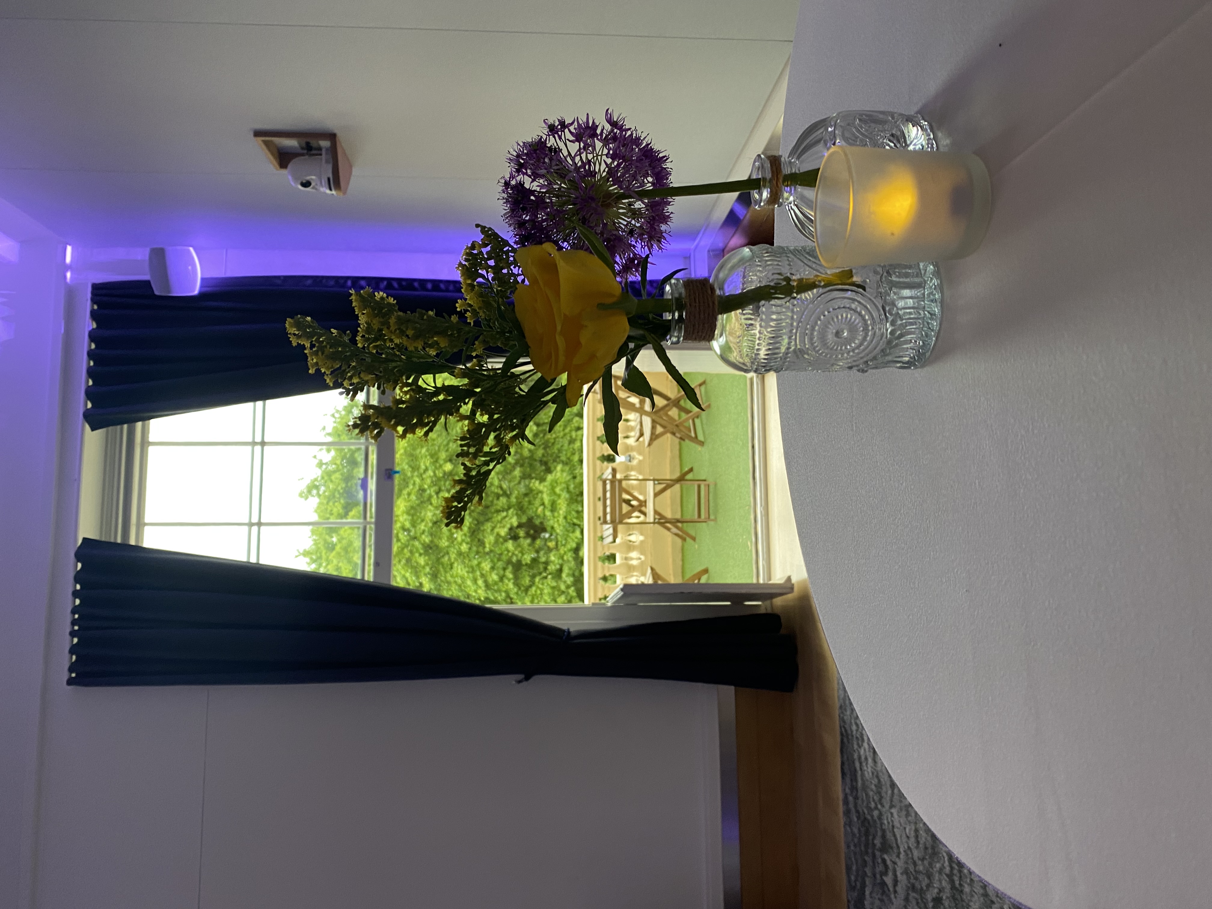 Elegant table setting with flowers at National Grid, perfect for intimate events and networking.