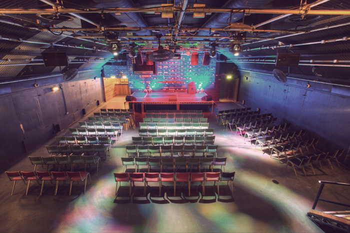 Versatile event space in Gorilla Manchester with tiered seating for performances and presentations.