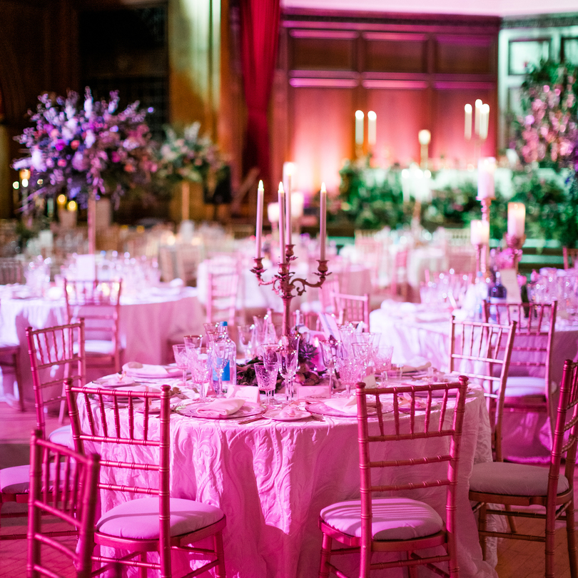 Elegant banquet hall with pink linens, ideal for weddings and gala dinners.