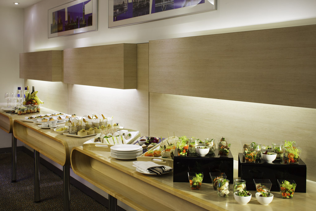 Catering setup in Southwark Suite, Novotel London City South for networking events.