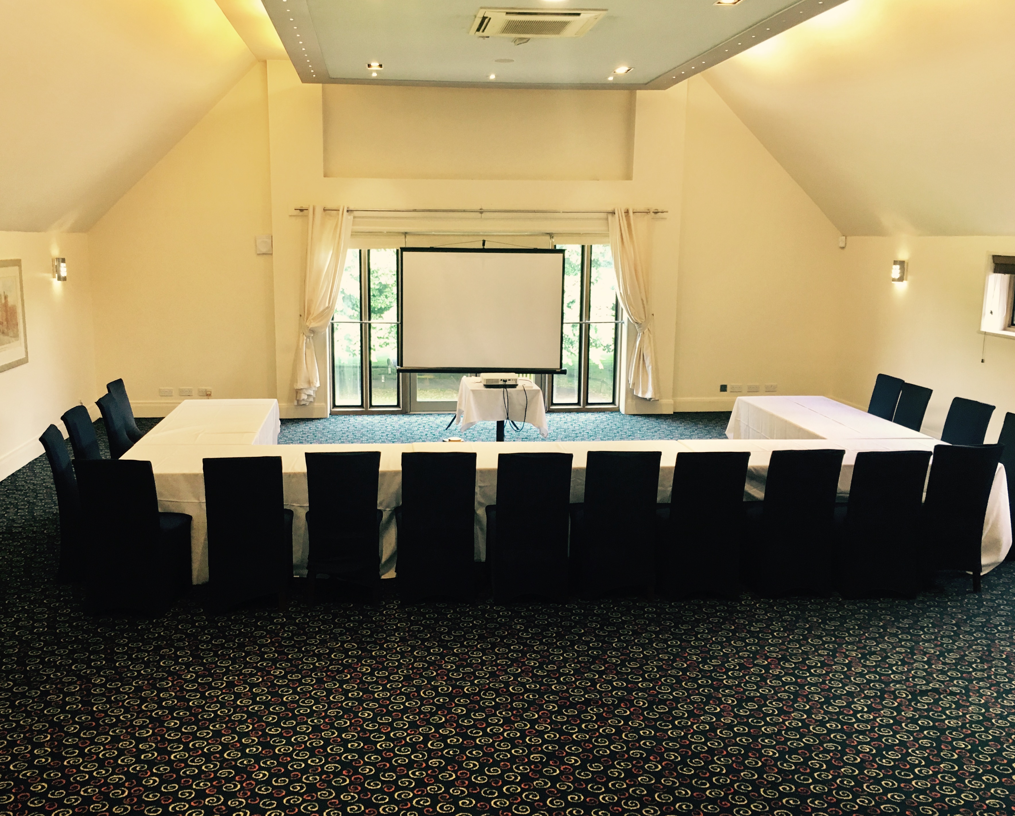 Fallow Suite meeting room at Hampton Court Palace Golf Club, U-shape setup for workshops.