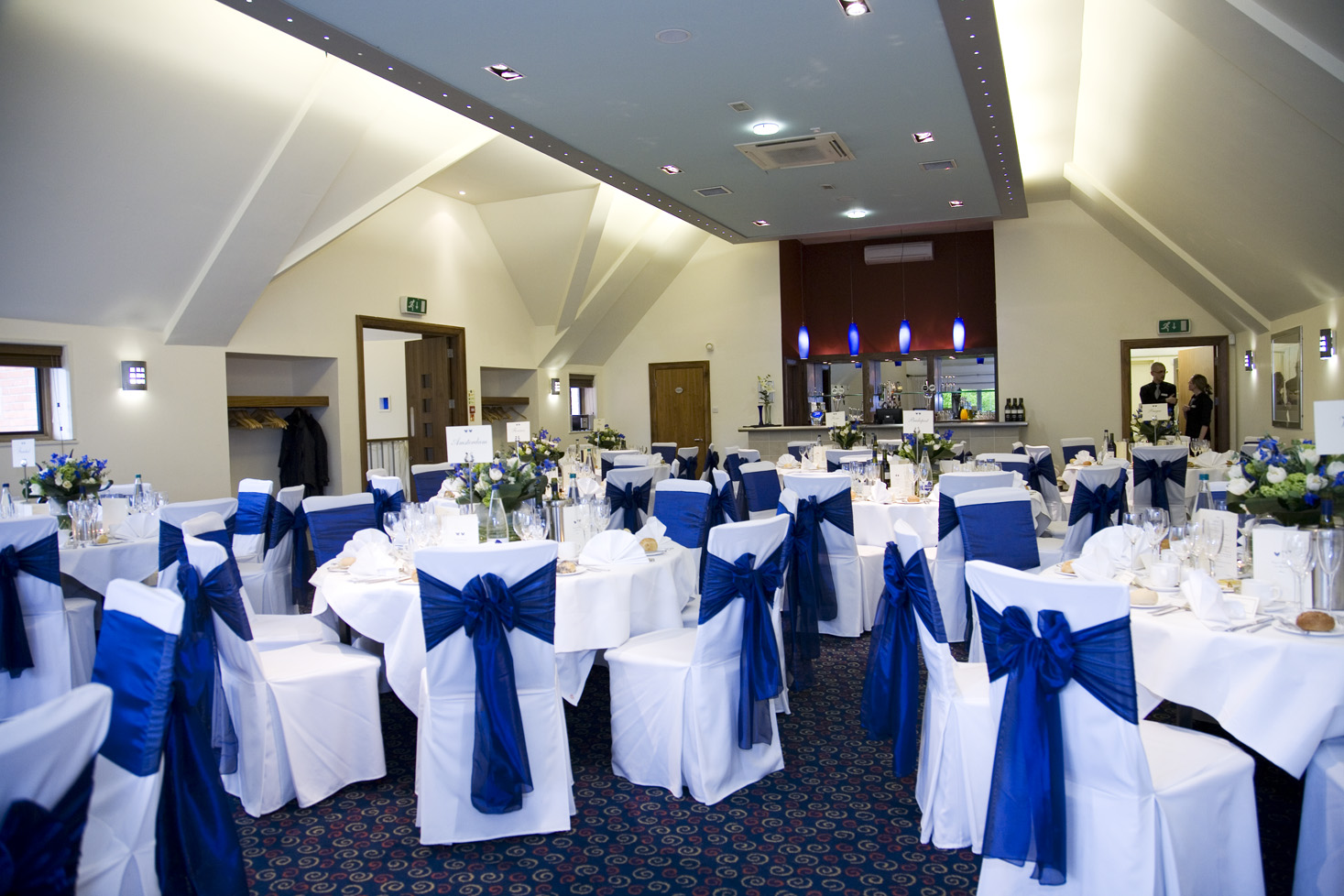 Fallow Suite at Hampton Court Palace Golf Club, elegant tables for weddings and events.
