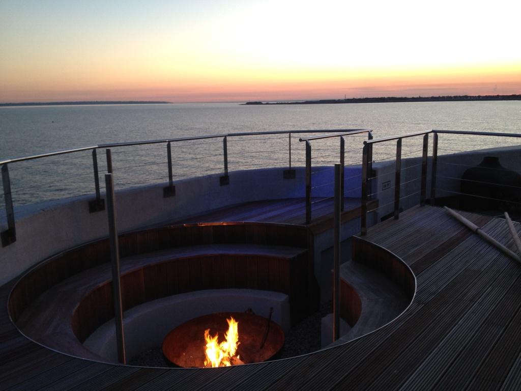 Central Atrium in No Man's Fort with cozy fire pit, ideal for cocktail receptions.