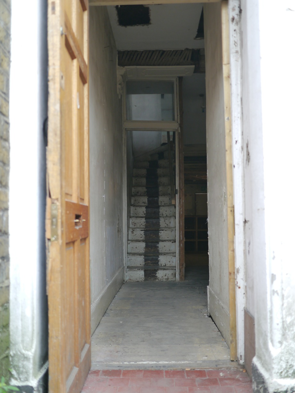 Transitional space with staircase in Safehouse 1, perfect for unique events and networking.