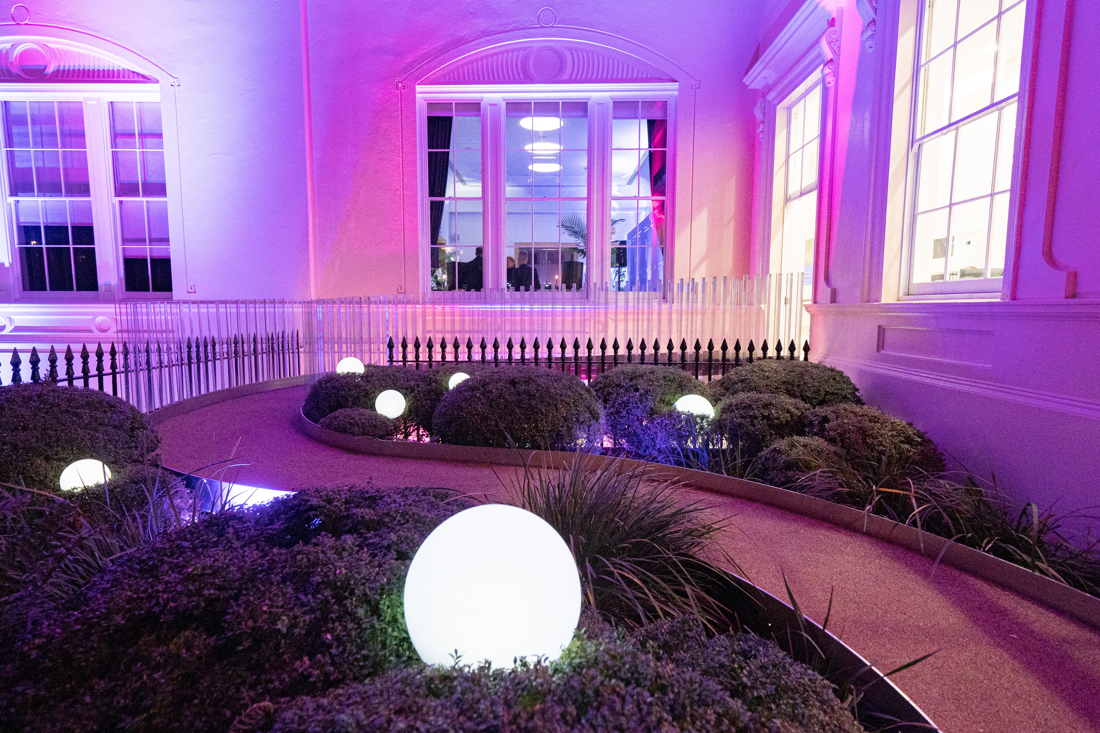 Michael Bishop Foundation outdoor space with glowing lights, ideal for evening events.