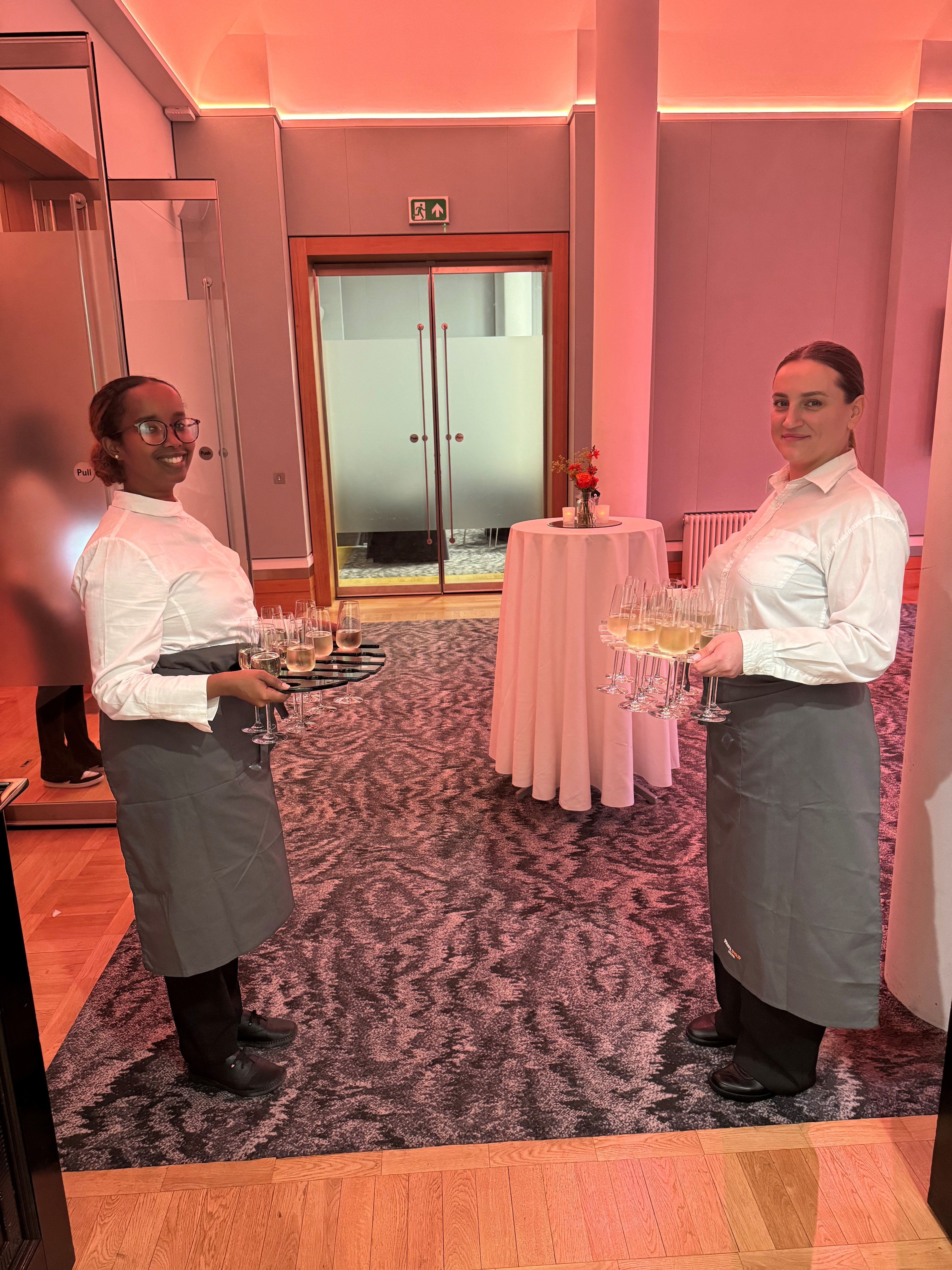 Rolls Royce at Prince Philip House with servers for a sophisticated networking event.