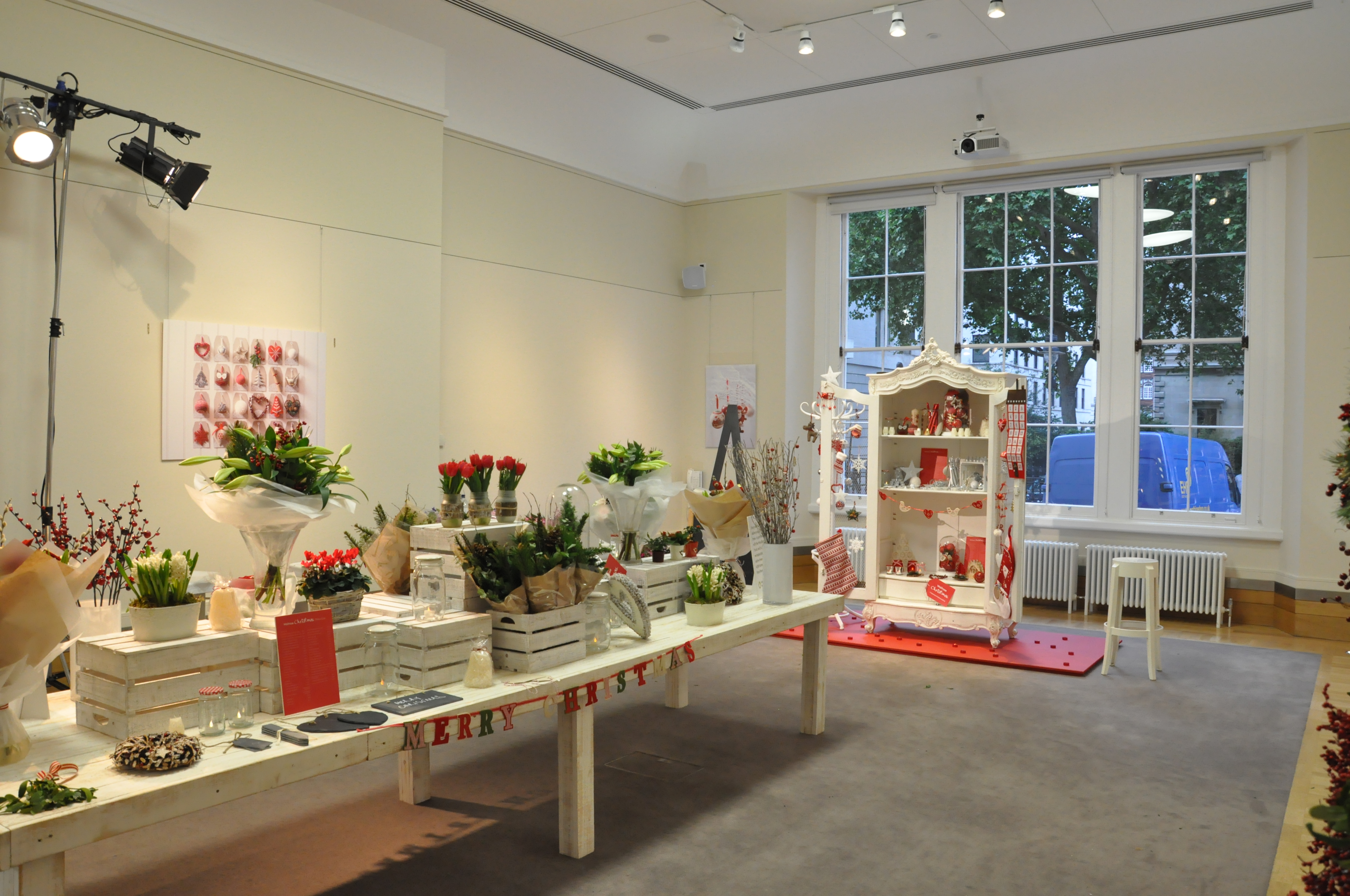 Rolls Royce in a bright event space for floral workshops and gatherings.