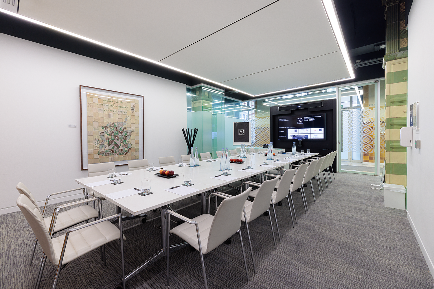 Modern conference room with glass walls for professional meetings at 30 Euston Square.