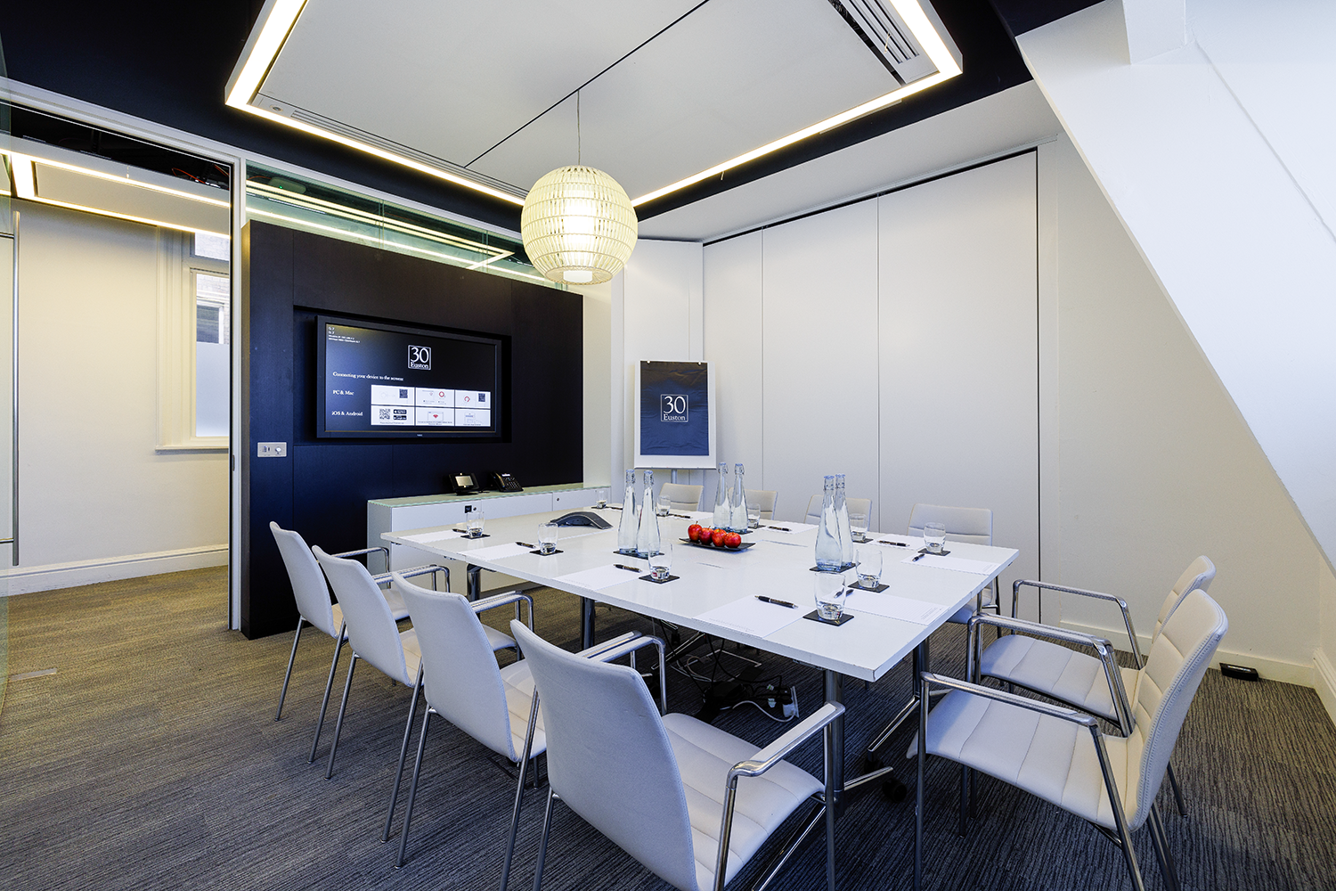 Modern meeting room at 30 Euston Square with sleek table, ideal for corporate events.