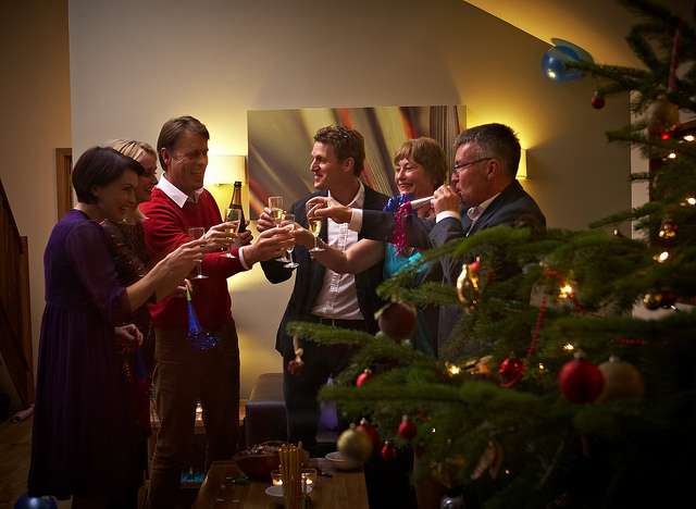 Festive gathering at Forest Cabin with Christmas tree, ideal for holiday events.