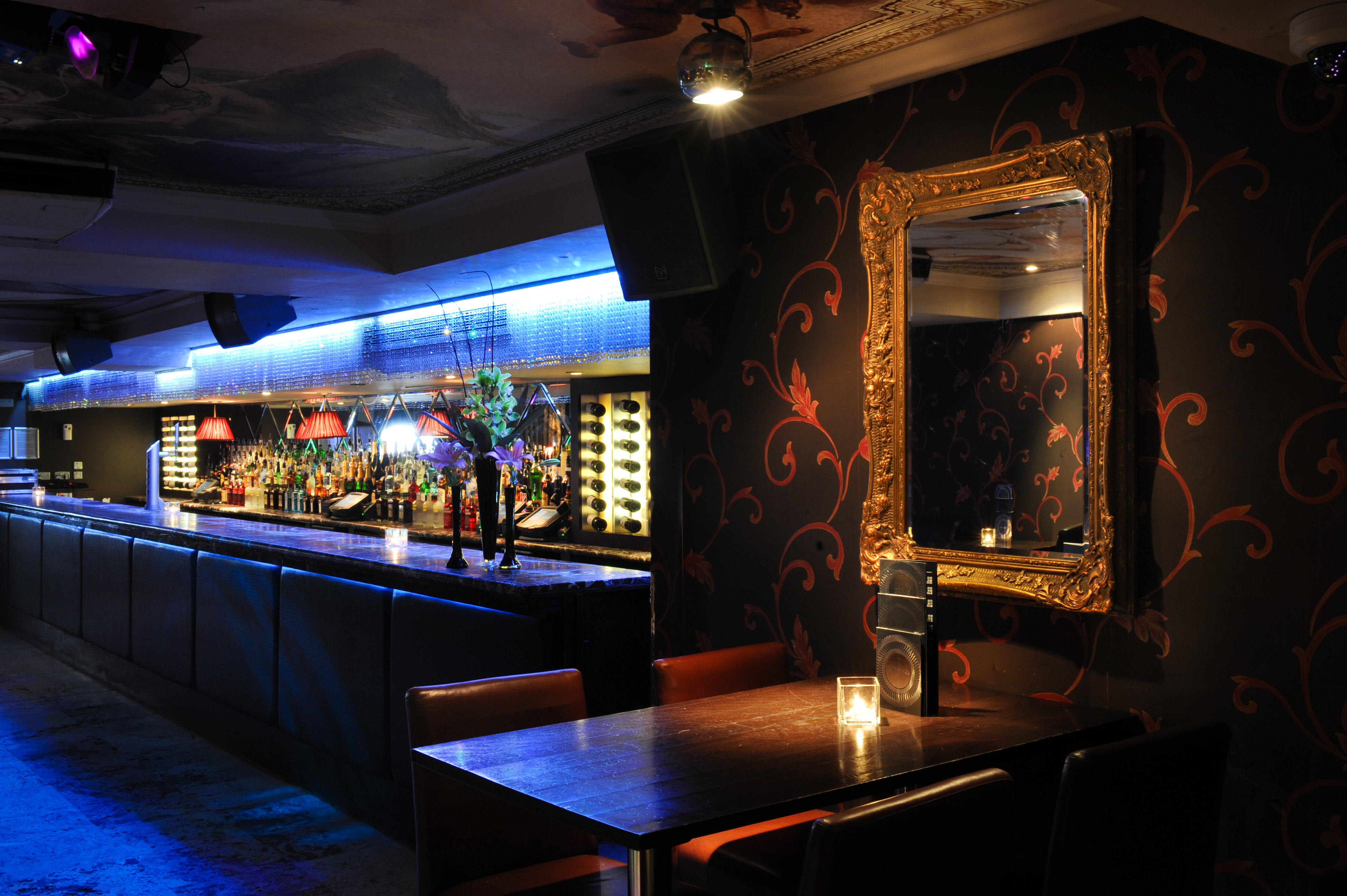 Stylish Ruby Blue bar with elegant decor, ideal for networking events and gatherings.