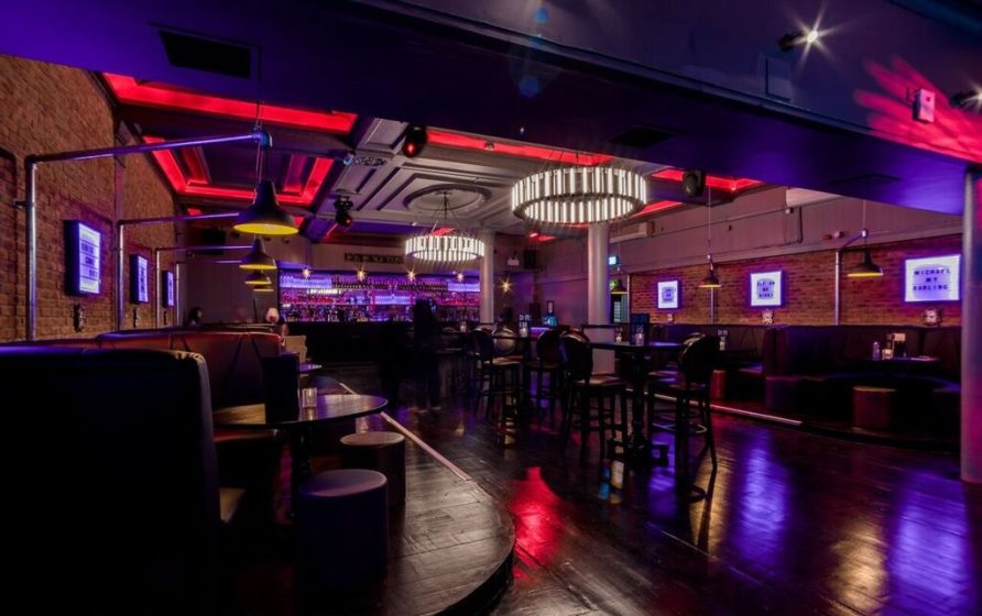 Stylish cocktail bar with modern decor, perfect for events and gatherings in Sway.