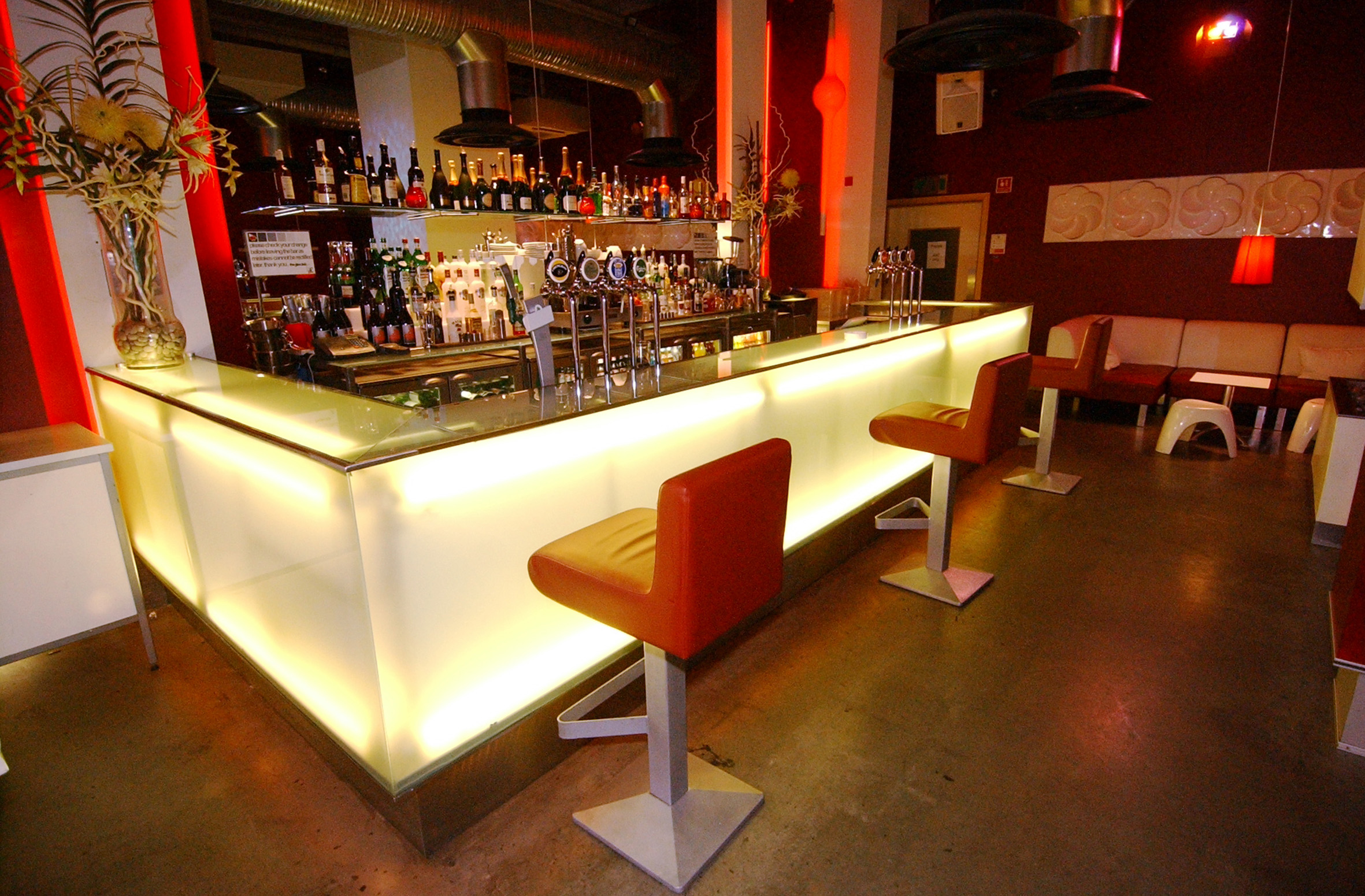 Modern Lounge Bar in Glee Club Birmingham with illuminated counter, perfect for events.