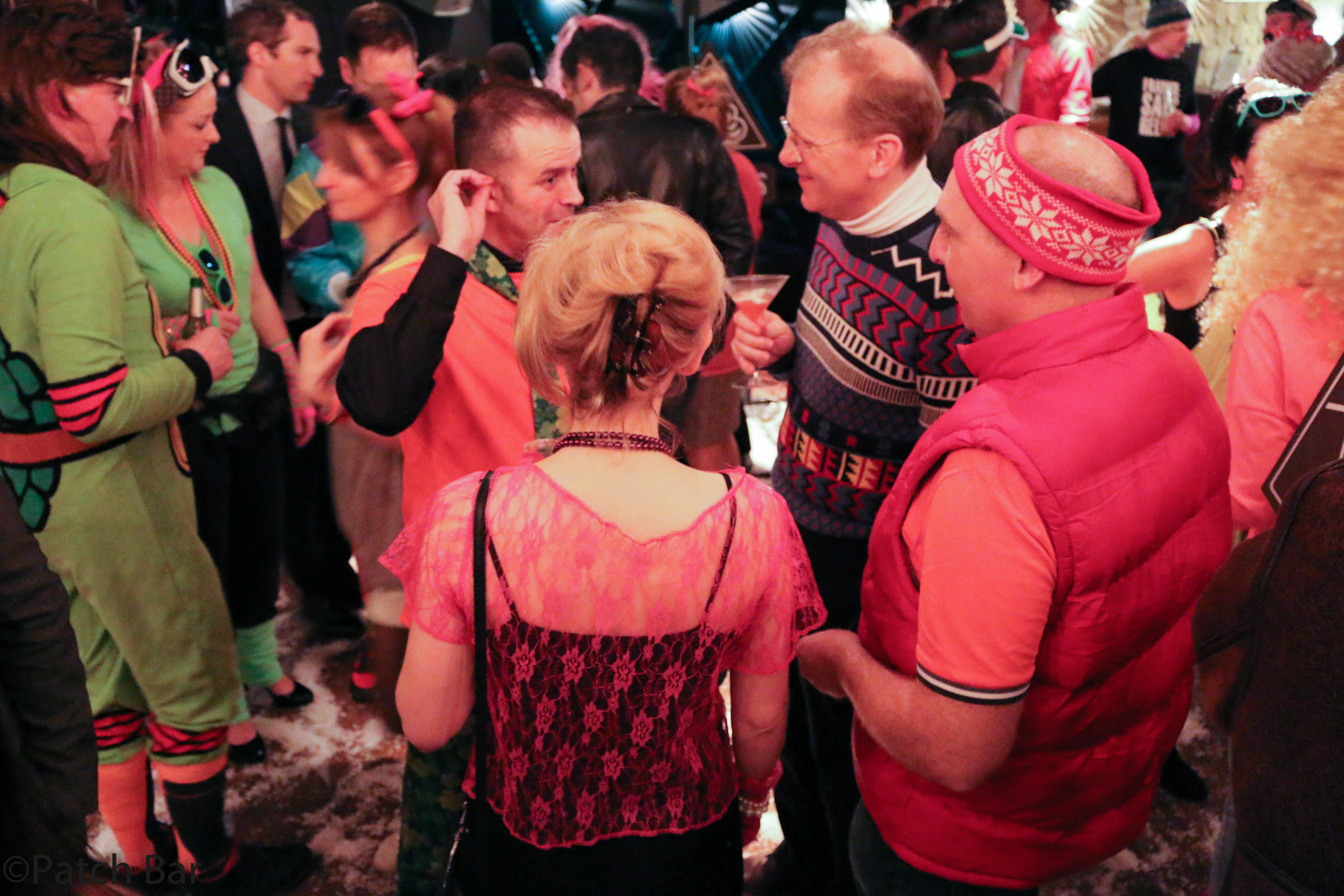 Vibrant boudoir party in Patch St Paul with eclectic outfits and networking opportunities.