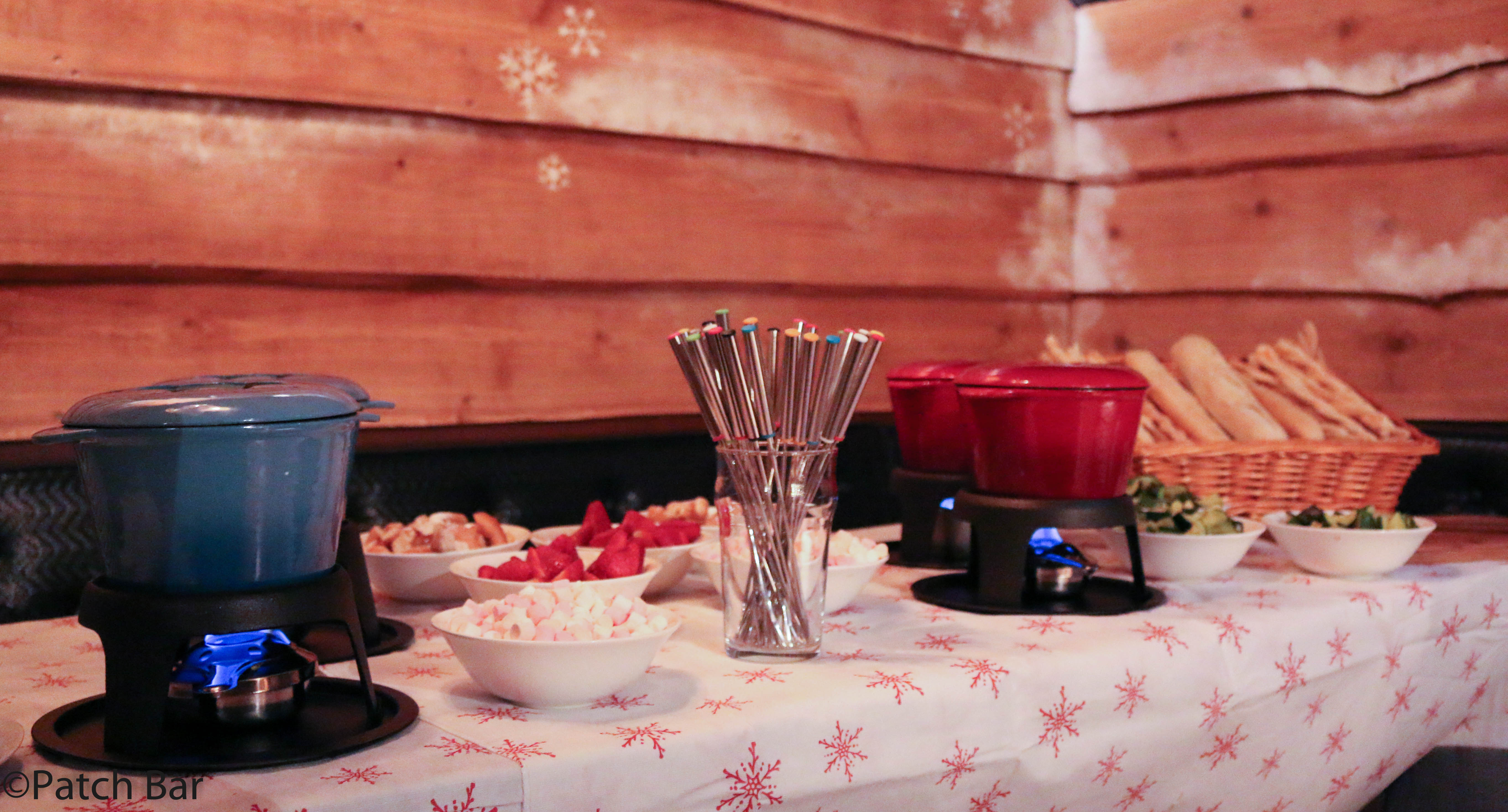 Interactive food station with fondue pots at Lodge in Patch St Paul’s event.