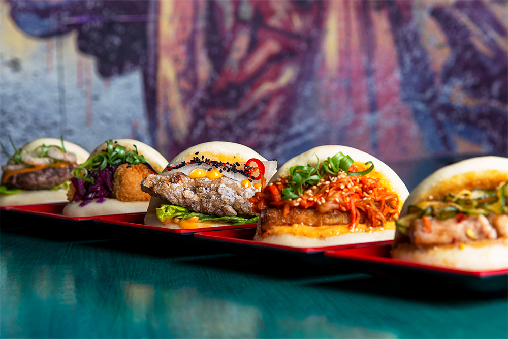 Gourmet bao buns at The Den, ICE BAR London for vibrant event catering.