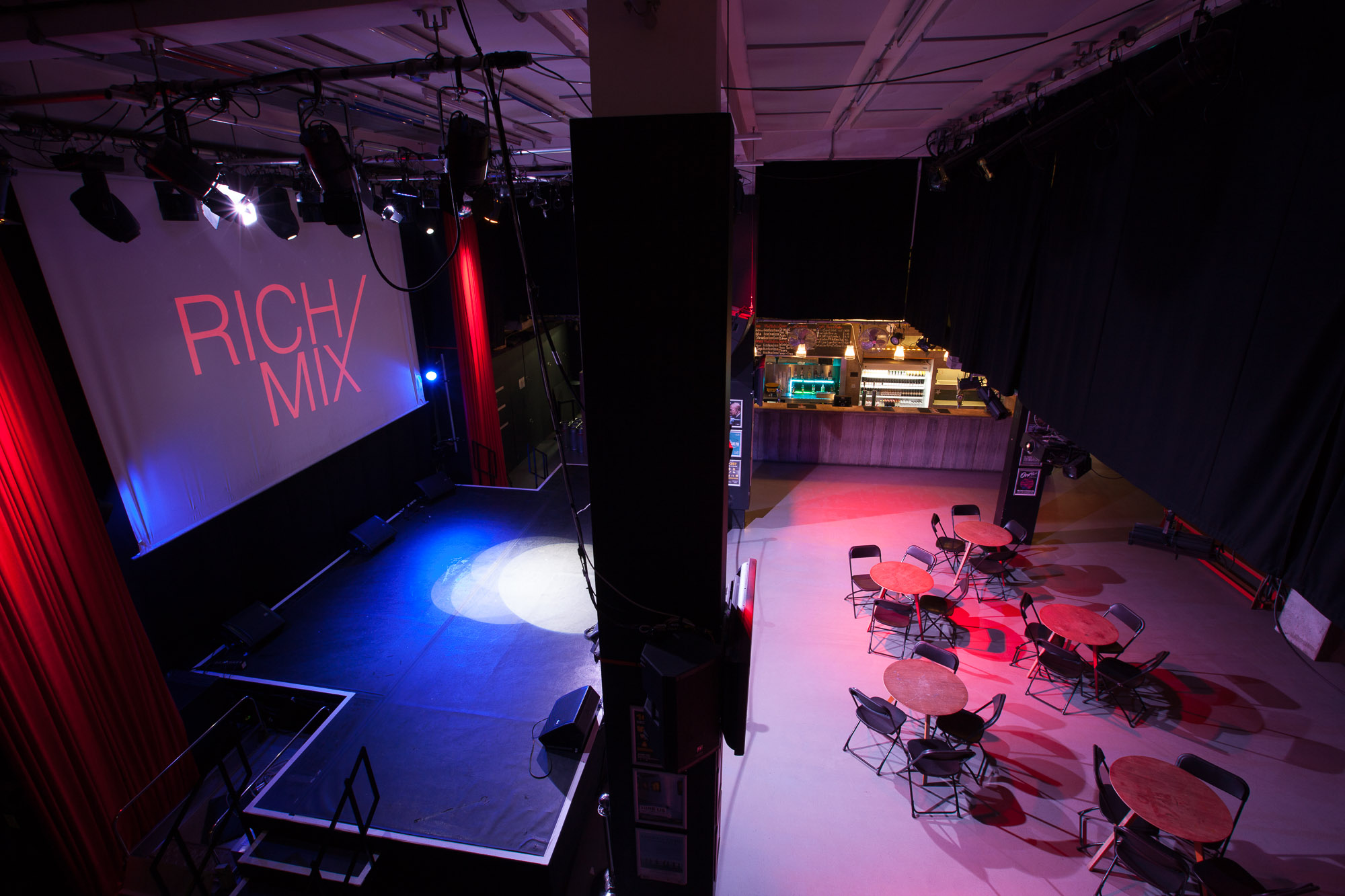Versatile event space with stage and professional lighting at Rich Mix for performances and gatherings.